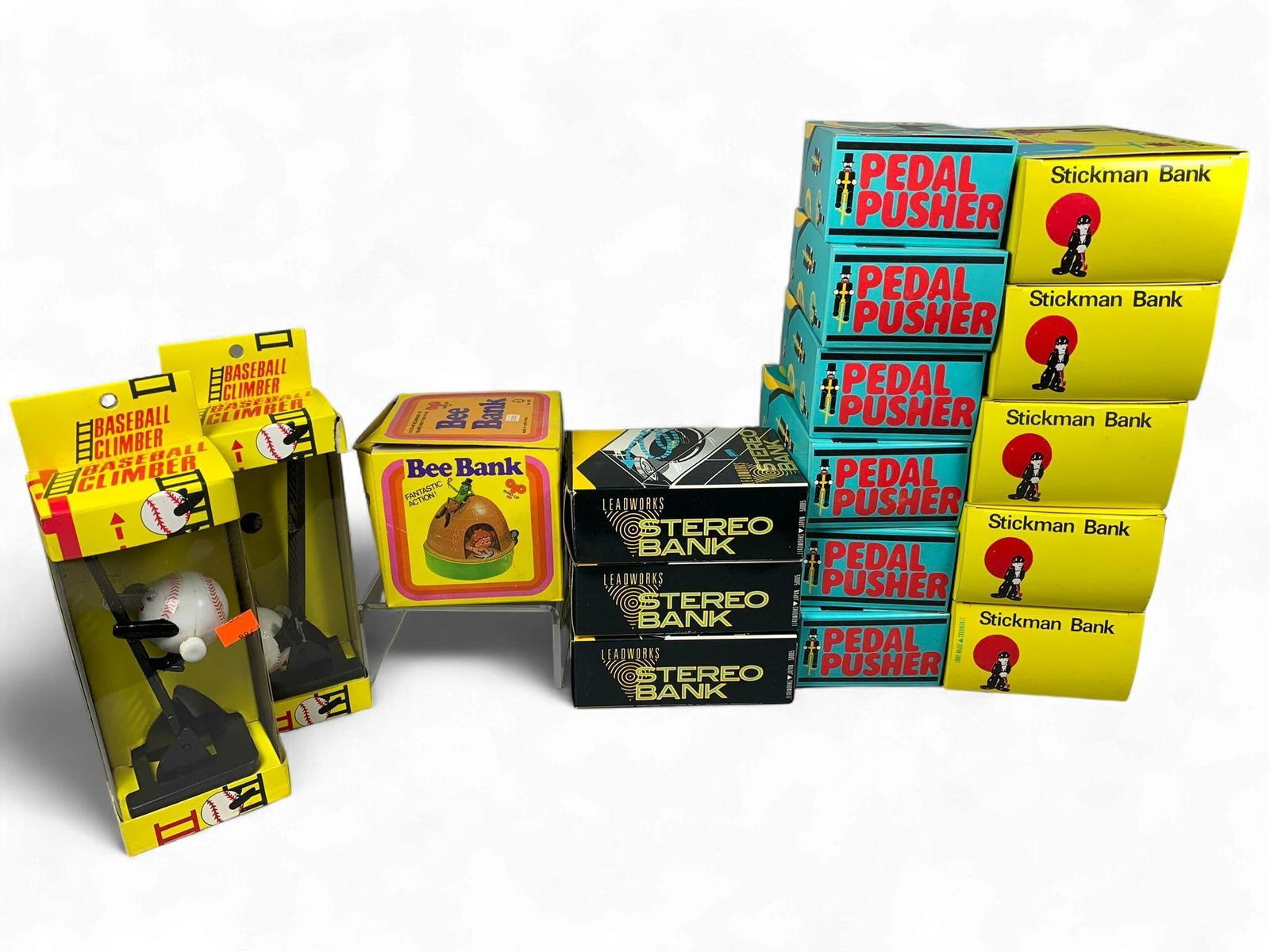 A Collection of Vintage LEADWORKS Mechanical Novelty Banks and Toys, Made in Japan, circa 1970s-1980: This collection features multiple vintage novelty mechanical banks and toys, predominantly under the "LEADWORKS" brand, all explicitly marked "Made in Japan". Dating from the mid-to-late 20th century,