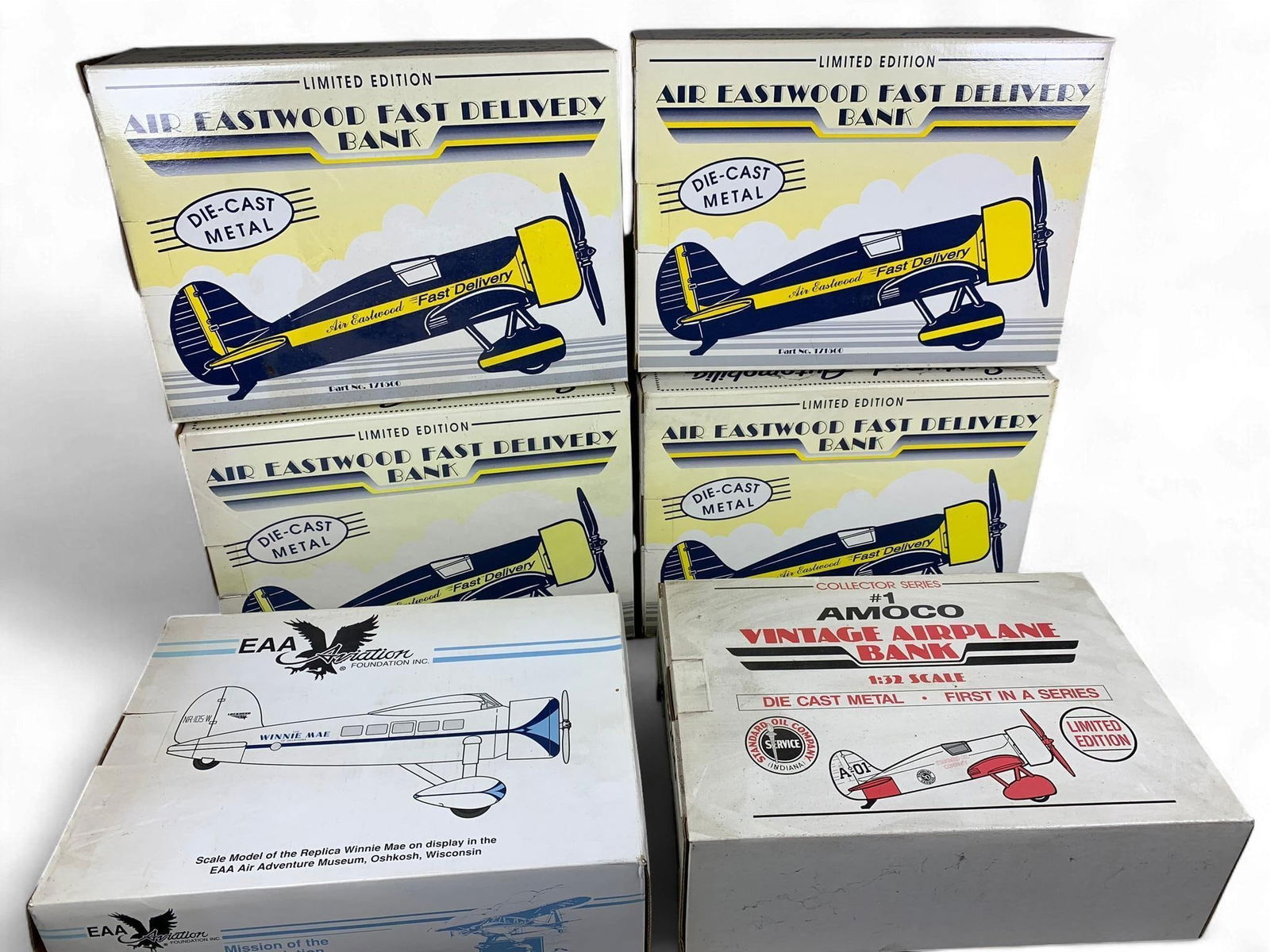 A Collection of Spec Cast diecast Metal Airplane Coin Banks, including 'Travel Air Mystery Ship,' 'W (1 of 9)