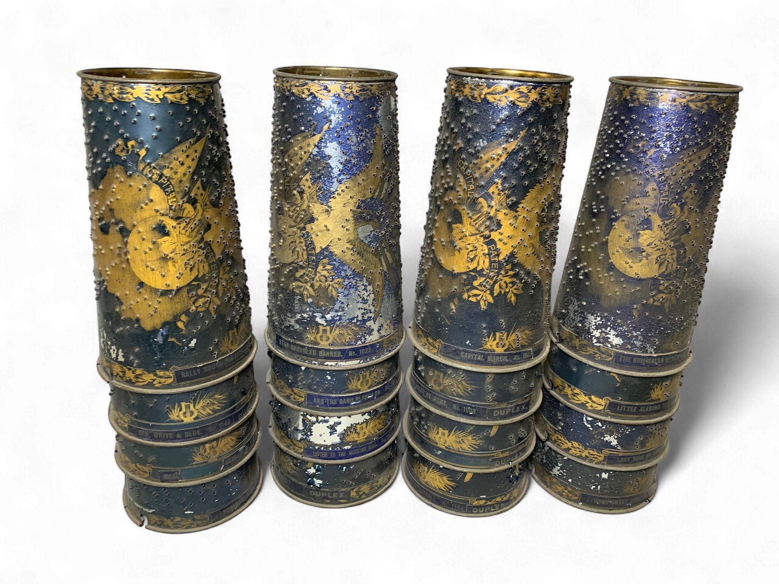 A Collection of Capital and Duplex Interchangeable Music Box Cylinders, Late 19th/Early 20th Century: A collection of interchangeable metal musical cylinders for Capital and Duplex mechanical music boxes. Dating to the late 19th or early 20th century, with visible patent dates of 'MAY 15-1894, JAN. 8-