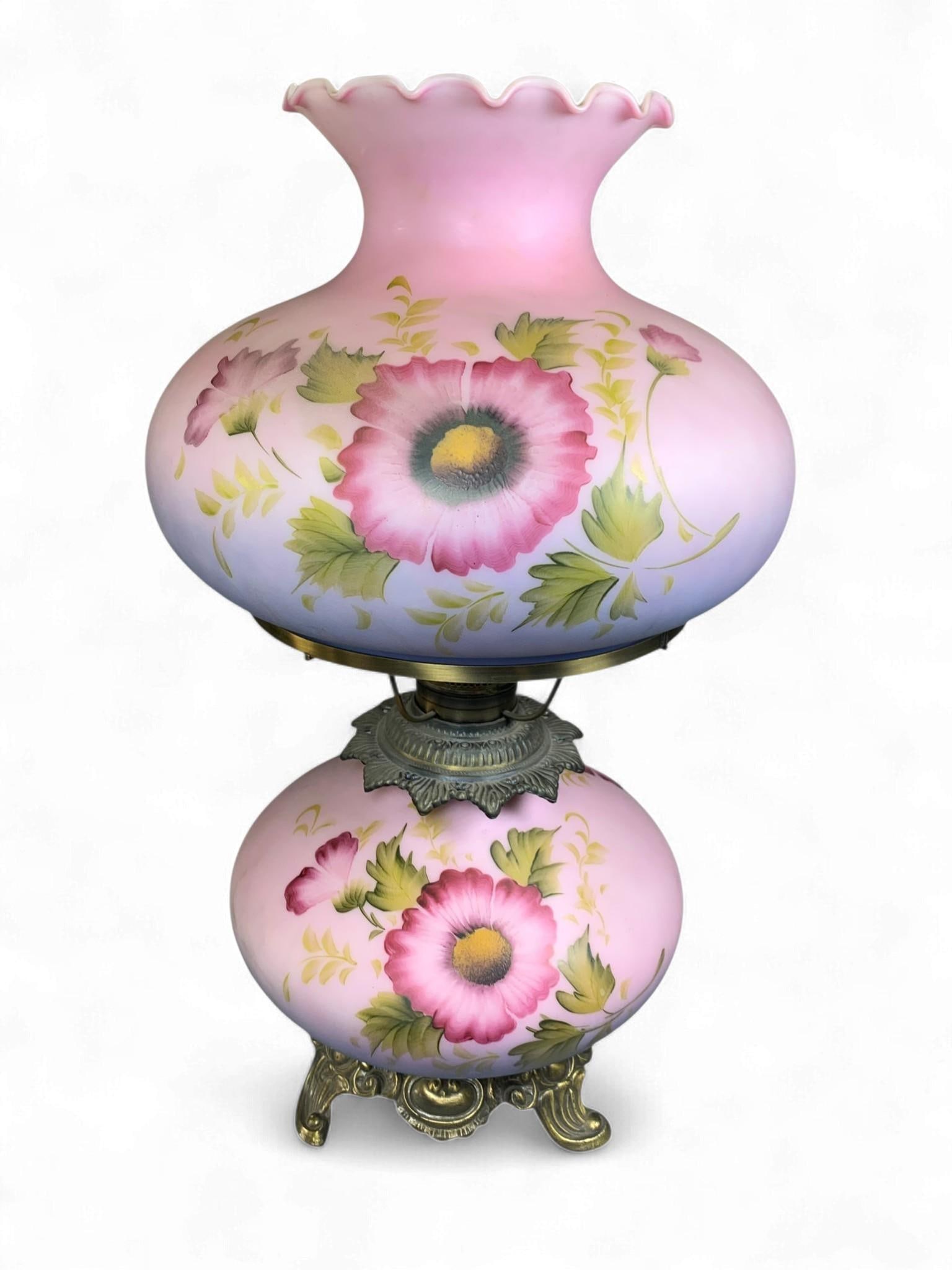 A Late 19th/Early 20th Century 'Gone With The Wind' Style Electric Parlor Lamp: A late 19th/early 20th-century 'Gone With The Wind' style electric parlor lamp, comprising two pink satin glass globes. The globes feature a gradient fade to lavender toward the top of the upper globe