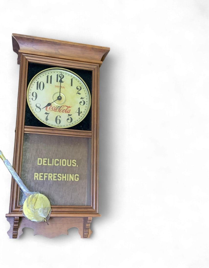 Vintage Craft Products Company Coca-Cola 'Delicious, Refreshing' Regulator Wall Clock, a 3/4-Size Re: A vintage Coca-Cola advertising wall clock by Craft Products Company, presented as an authentic 3/4-size reproduction of the Regulator Clock circa 1900. The clock features a brown stained wooden case