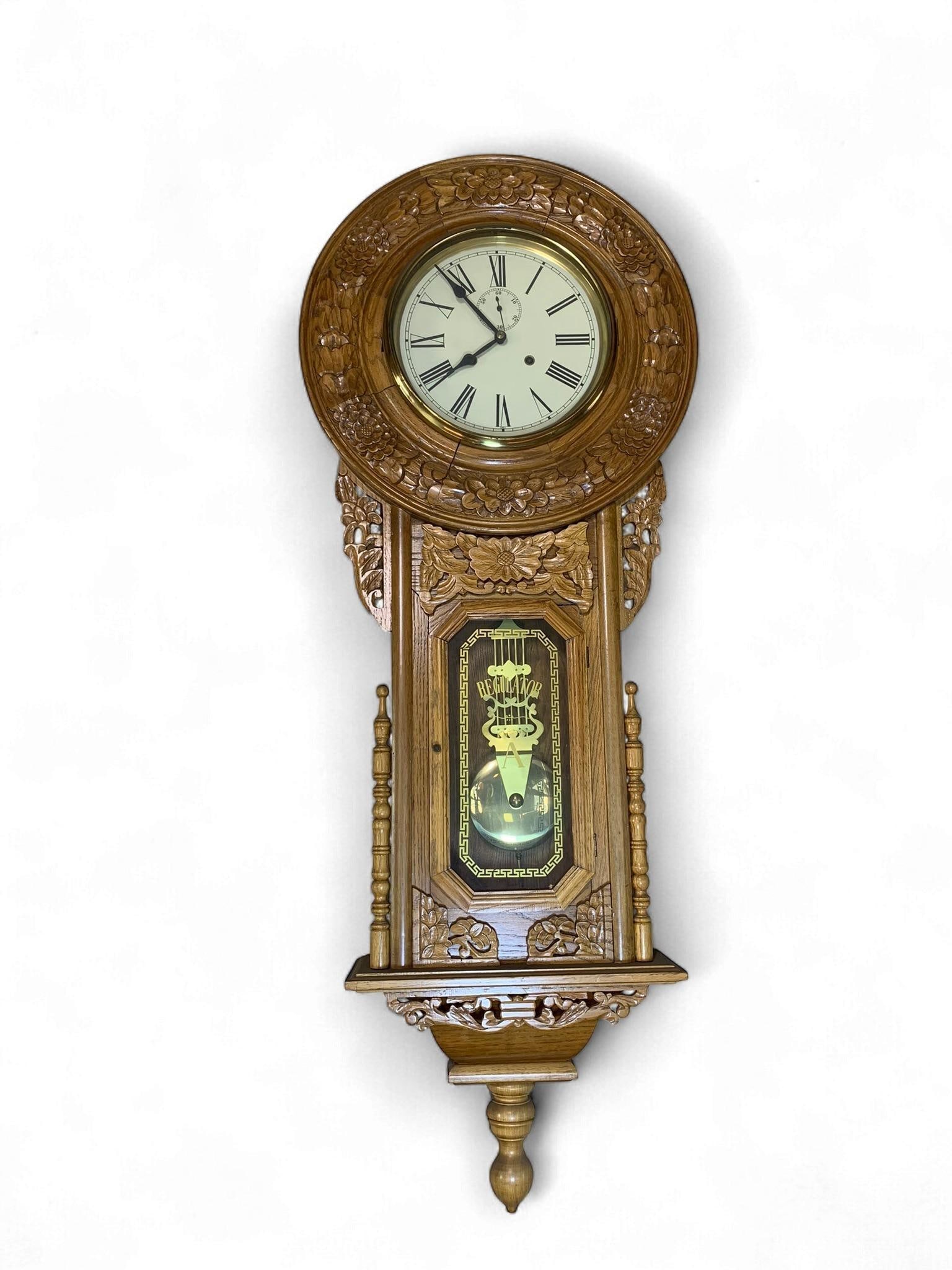 Modern Large Carved Oak Wall Regulator Clock: NOTE: THIS LOT IS LOCATED IN NEWARK OHIO AND PICKUP WILL BE OCT 30 FROM NOON TO 2 PM. NO BRING BACK OR SHIPPING. ONLY BID IF YOU CAN PICK UP IN NEWARK AT THAT TIME. A modern large carved oak wall regu