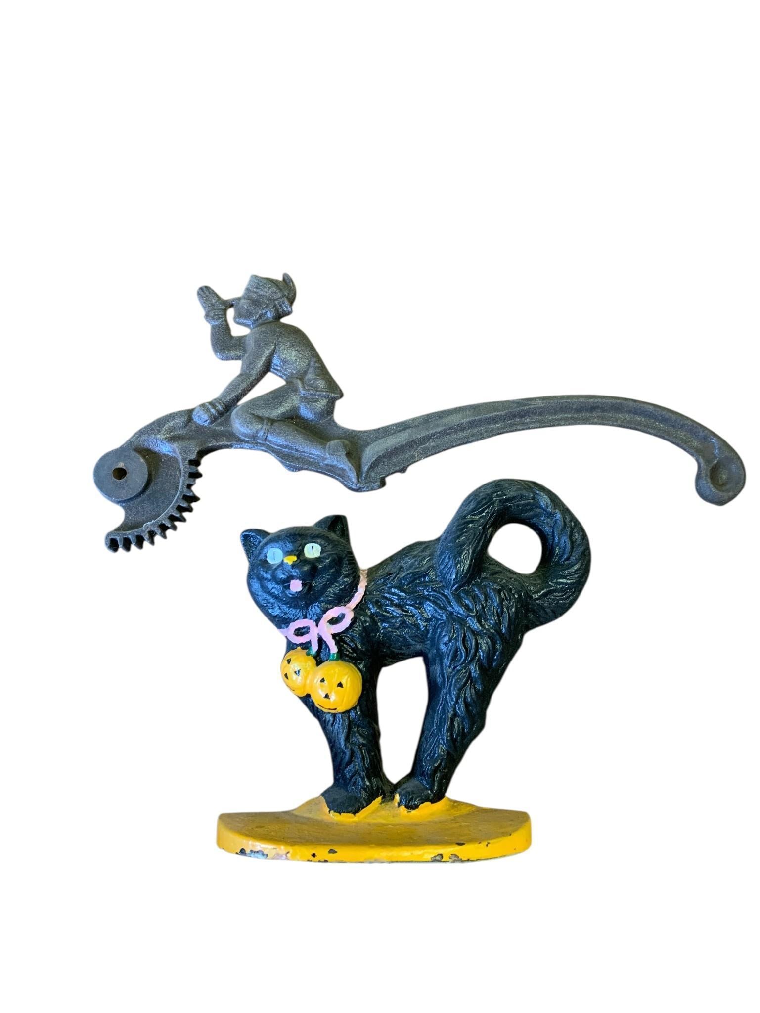A Cast Iron Black Cat Halloween Door Stop and a Figural Cast Metal Lever (1 of 13)