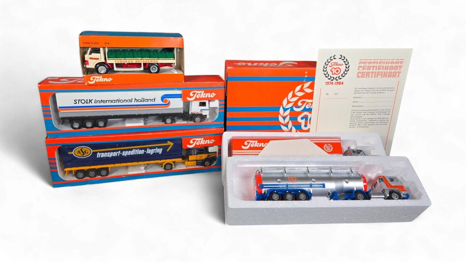 A Group of Tekno diecast Model Trucks, including a '10 Jaar 1974-1984' Anniversary Set with Volvo F8 (1 of 8)