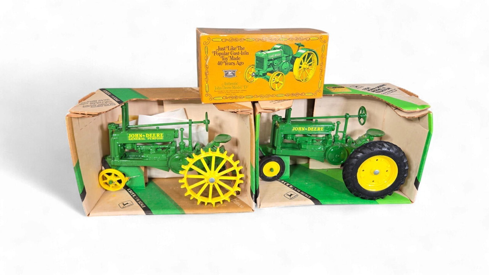 A Group of ERTL John Deere 1/16 Scale Model A and Model D Replica Tractors (1 of 7)
