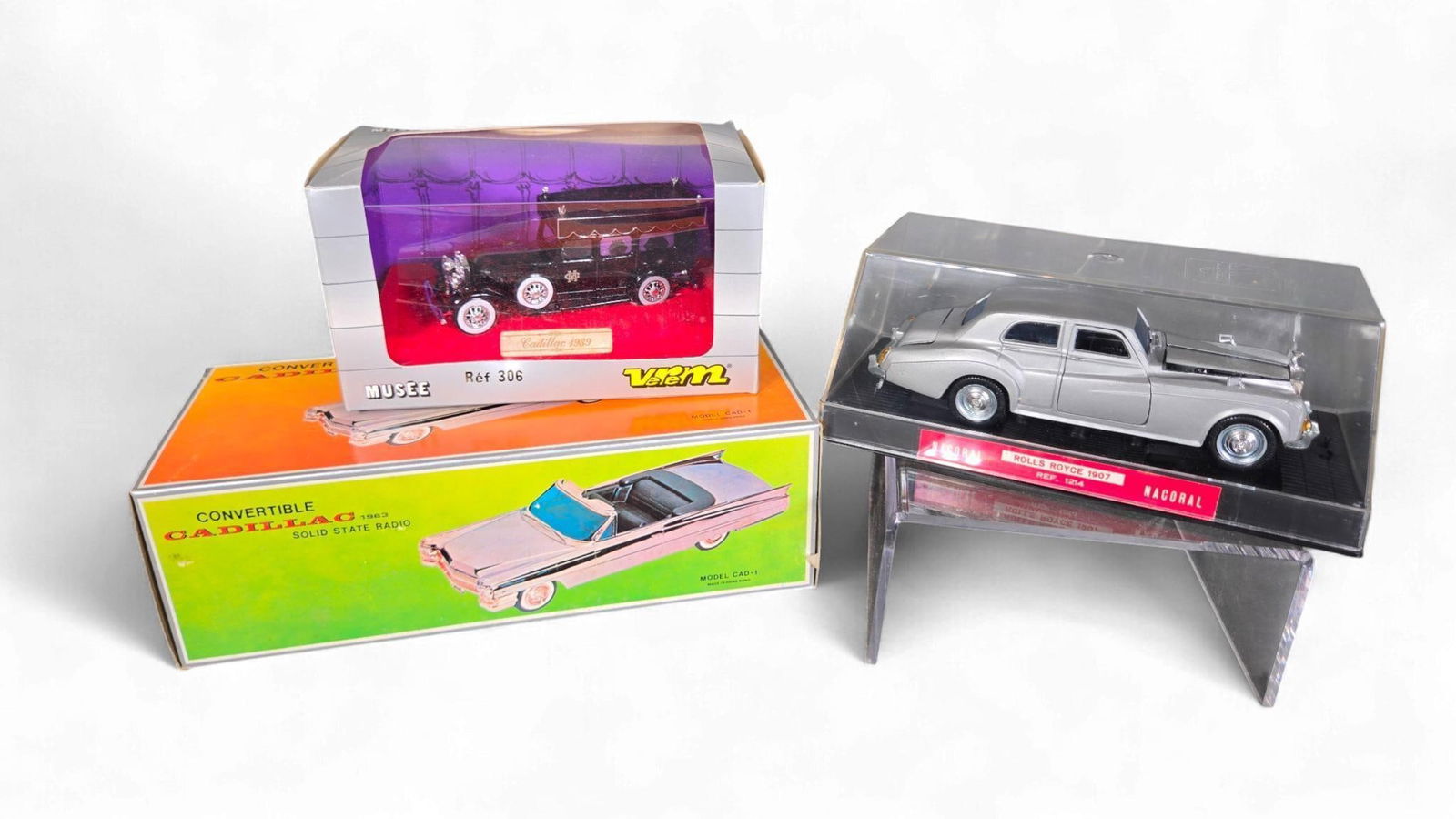 A Group of Vintage Model Vehicles, including a 1963 Cadillac Convertible Solid State Radio (1 of 9)