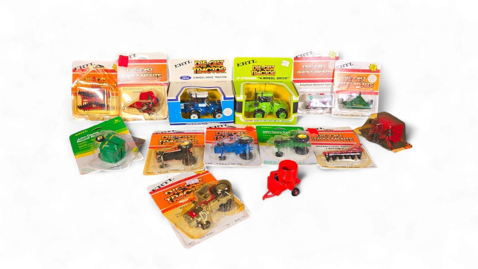 A Collection of Vintage Ertl 1/64 Scale diecast Farm Vehicles and Implements, circa 1980s (1 of 20)