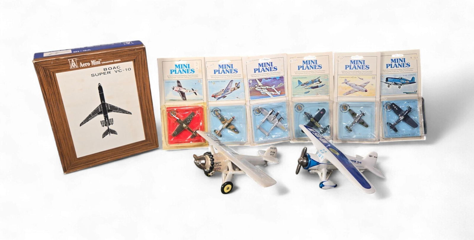 A Group of R.E.M. Originals 1972 "Famous Firsts" Ceramic Airplane Decanters, "The Winnie Mae" and "S (1 of 20)