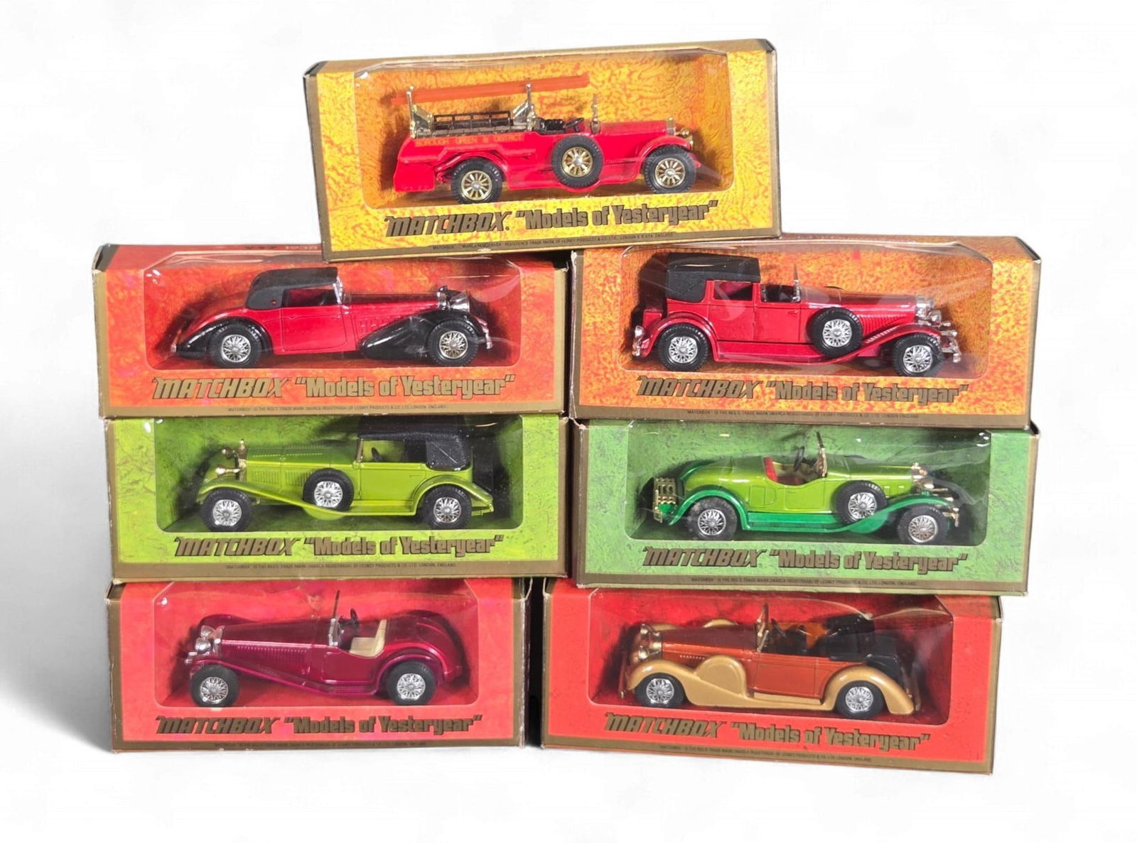 A Collection of Matchbox Models of Yesteryear diecast Model Automobiles, depicting Vintage Vehicles: A collection of Matchbox "Models of Yesteryear" diecast model automobiles, manufactured by Lesney Products & Co. Ltd. of London, England. Each model represents a vintage vehicle from the early 20th ce