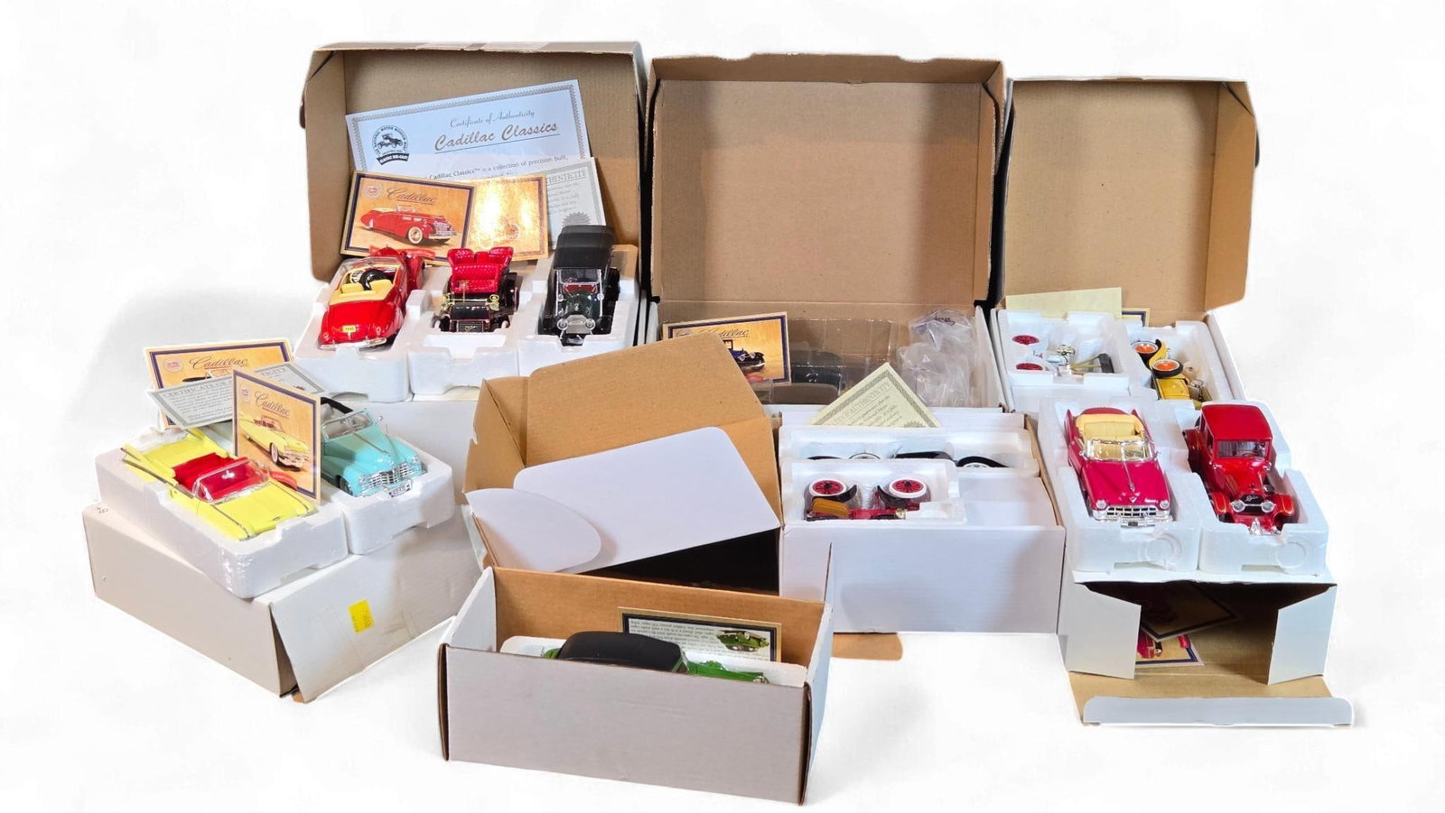 A Collection of 'Cadillac Classics' diecast Model Cars by Signature Models, 1/32 Scale (1 of 14)