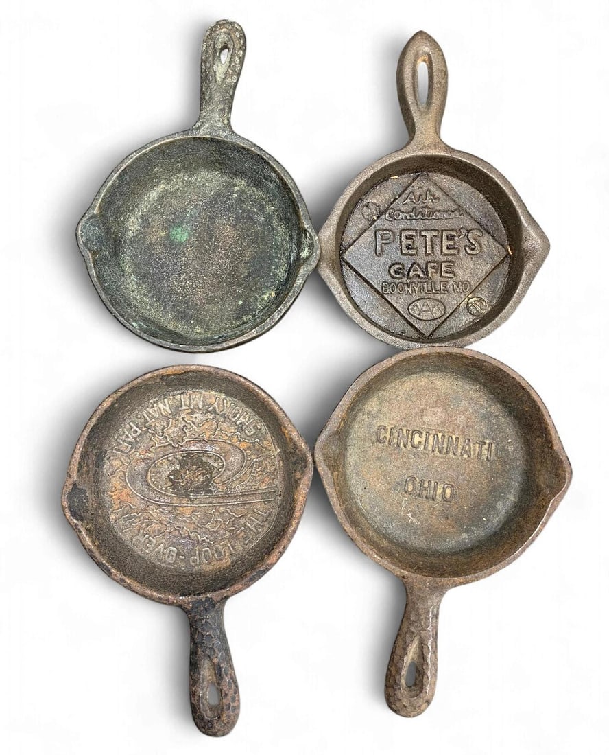 A Group of Vintage Miniature Cast Iron Advertising and Souvenir Skillets (1 of 8)