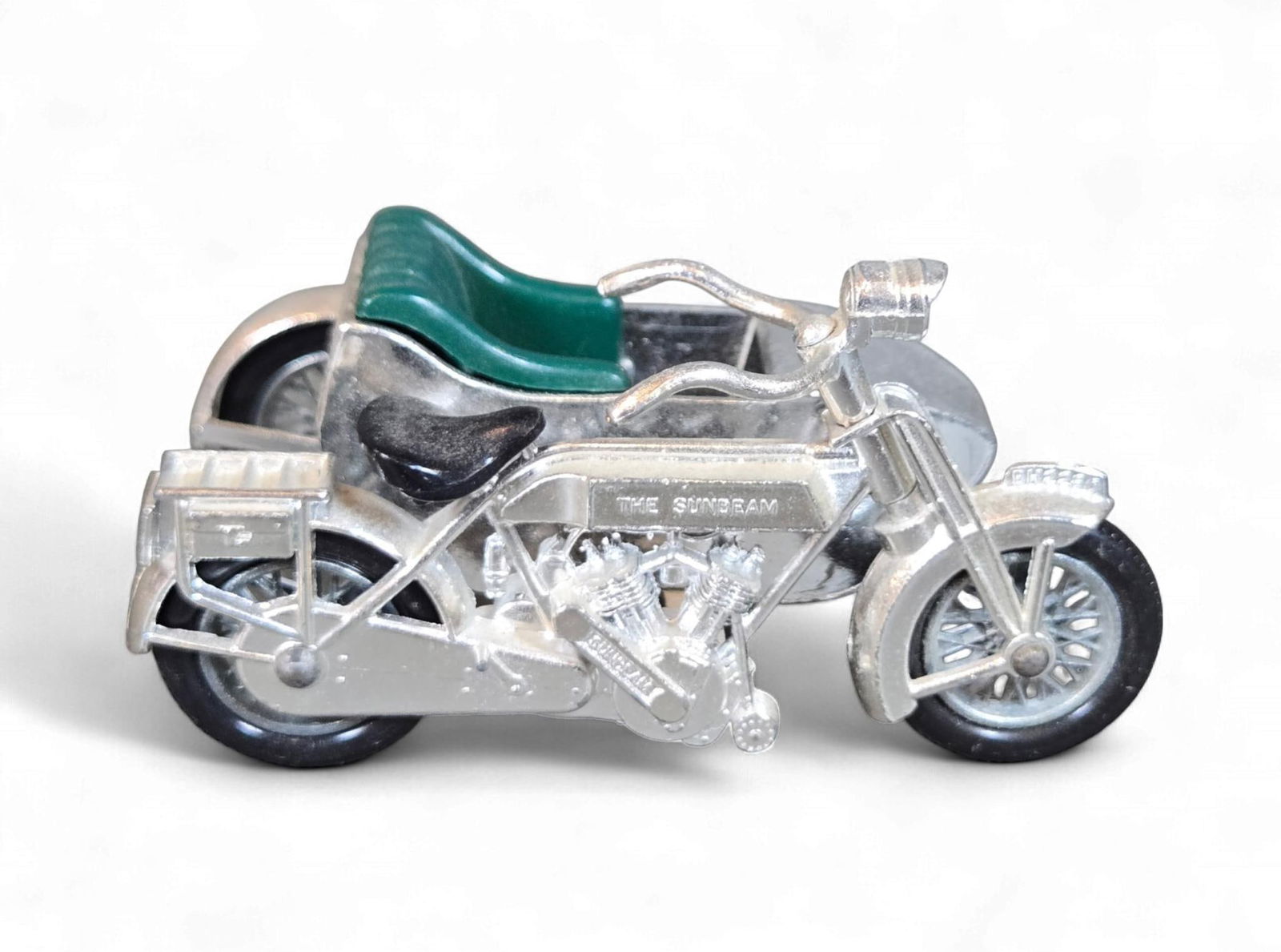 Matchbox Models of Yesteryear Y-8 1914 Sunbeam Motorcycle with Sidecar: A Matchbox Models of Yesteryear Y-8 1914 Sunbeam Motorcycle with Sidecar, made by Lesney in England. This miniature diecast metal and plastic model features a silver-tone finish. The motorcycle has a