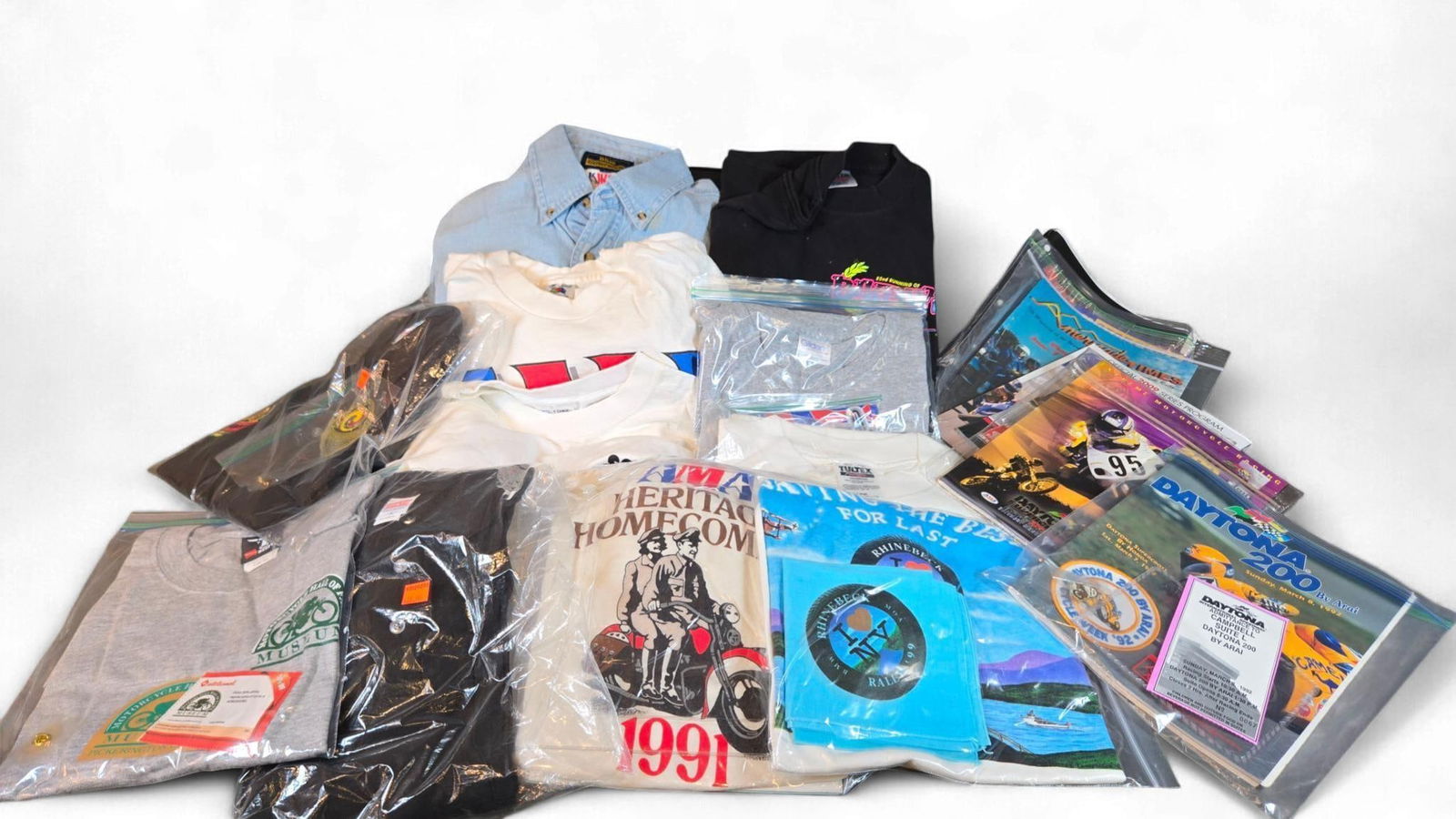 A Collection of Vintage and Contemporary American Motorcyclist Association (AMA) and Event-Themed Ap (1 of 20)