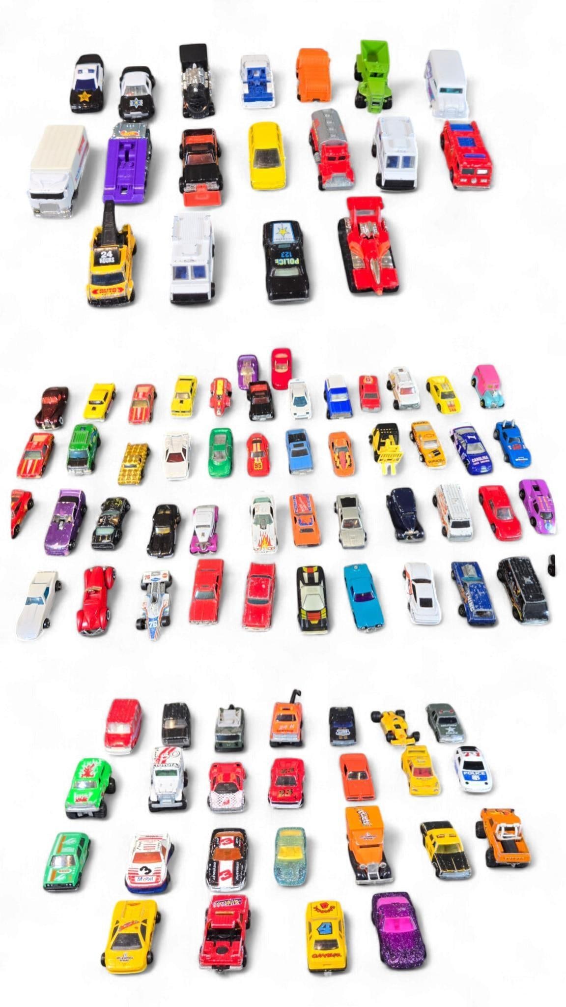 A Collection of Over 70 Miniature diecast Toy Vehicles, including a 1983 Hot Wheels Good Humor Ice C: The collection comprises over 70 miniature diecast toy vehicles, predominantly from brands such as Hot Wheels and Matchbox, with several from Majorette. The collection includes a 1983 Hot Wheels Good