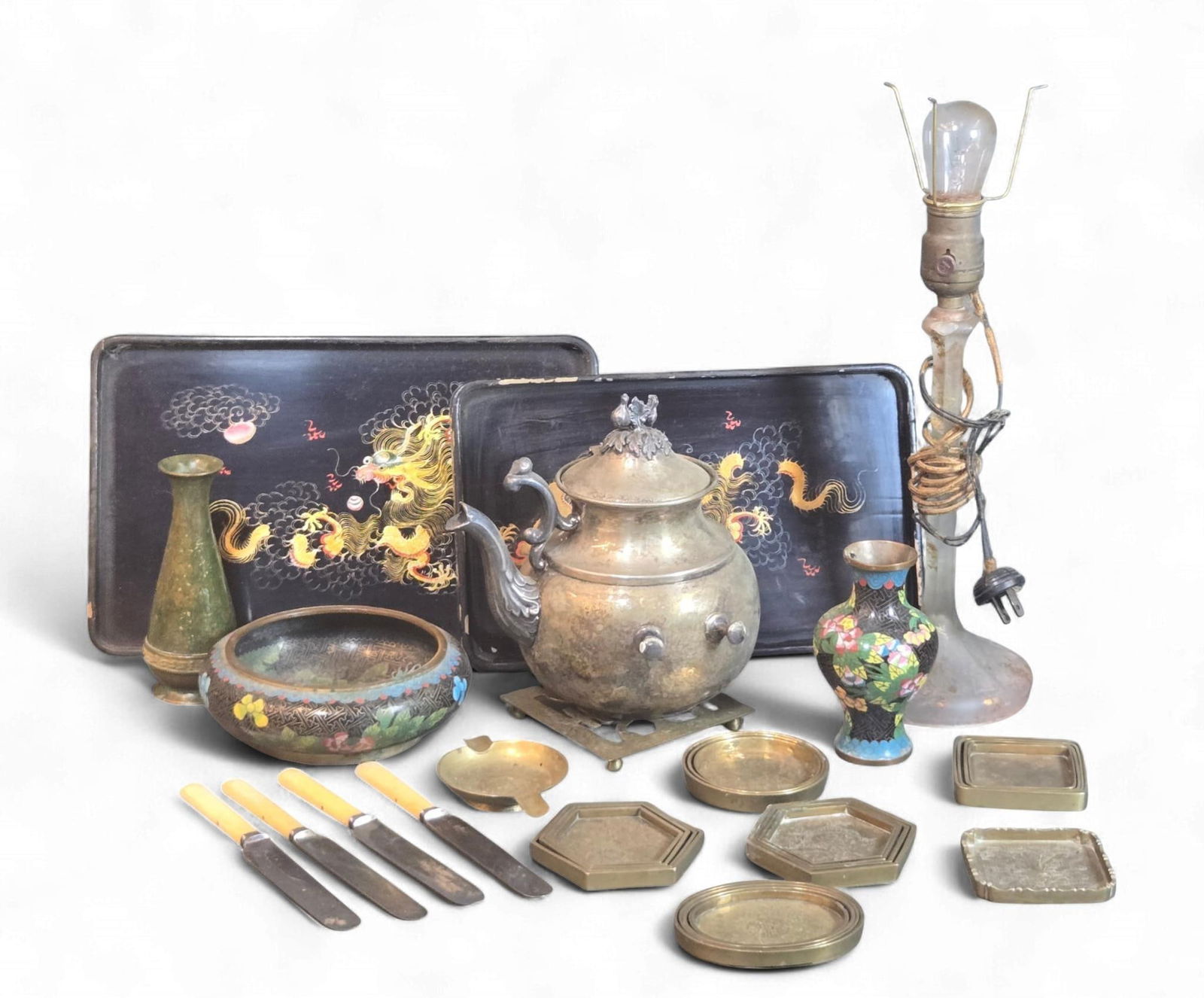 A Designco Heavy Silver Plate Pitcher and a Collection of Asian Decorative Objects: A Designco Heavy Silver Plate Pitcher or urn, with an ornate handle, spout, bird finial, and two spigots, clearly marked "Silver on Copper" along with other undeciphered hallmarks. Accompanying this l