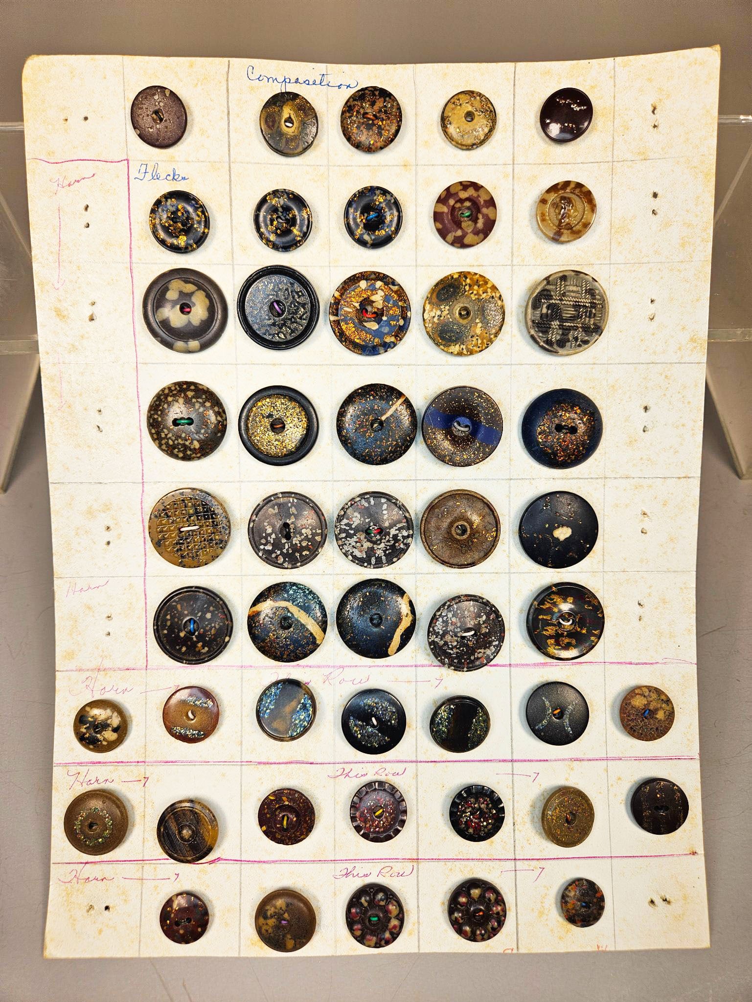 A Collection of Vintage Composition and Horn Clothing Buttons with Metallic Flecks (1 of 15)