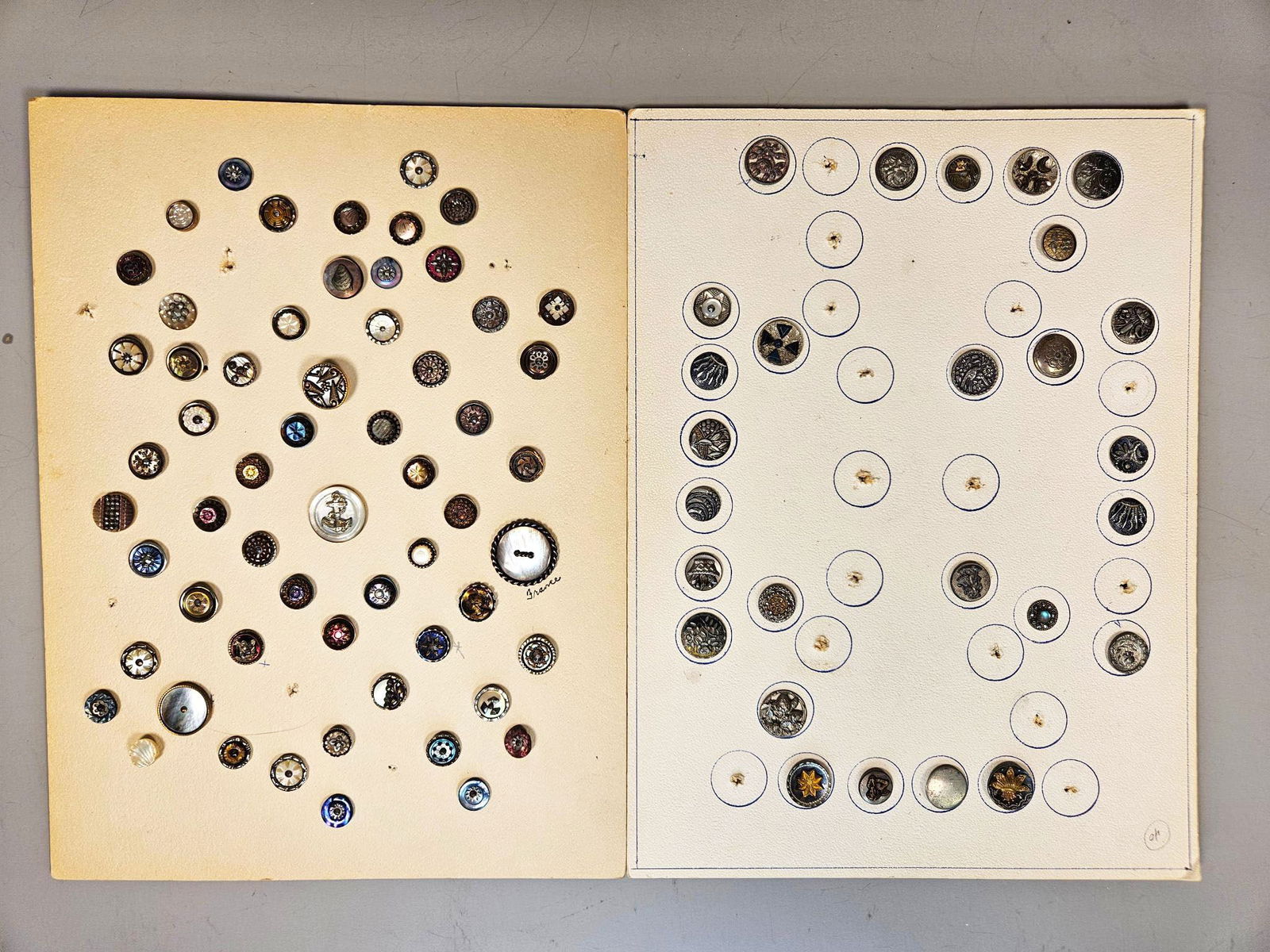 A group of Antique and Vintage Mother-of-Pearl and Abalone Shell Buttons on Display Cards, 19th-20th: This lot comprises an extensive group of antique and vintage buttons, primarily fashioned from iridescent mother-of-pearl and abalone shell, frequently set within diverse metal bezels or frames, appea