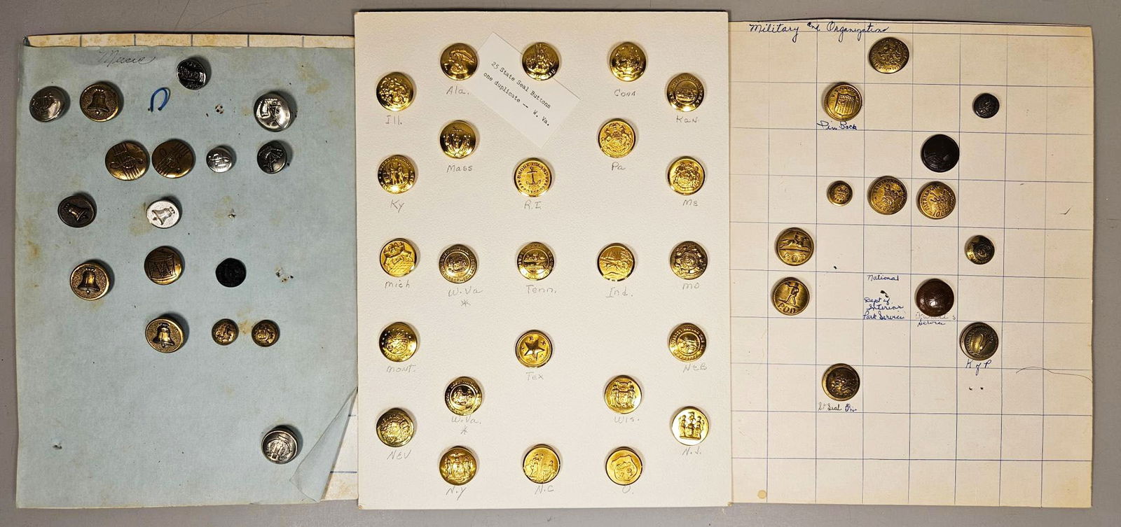 A Collection of Brass and Metal Uniform, State Seal, Military, and Music-Themed Buttons, including (1 of 19)