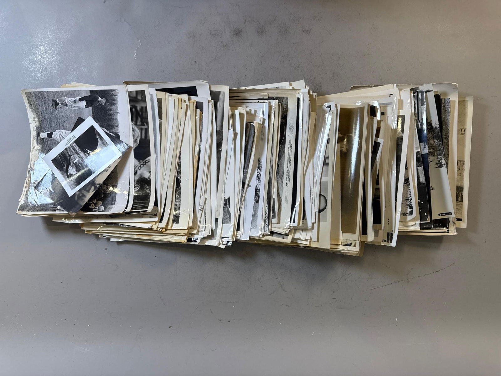 A Collection of Promotional Movie and Television Publicity Photos, Primarily 1960s: A substantial collection of black and white glossy photographic prints, identified through web intelligence and user-provided keywords as promotional movie and television publicity photos. The collect