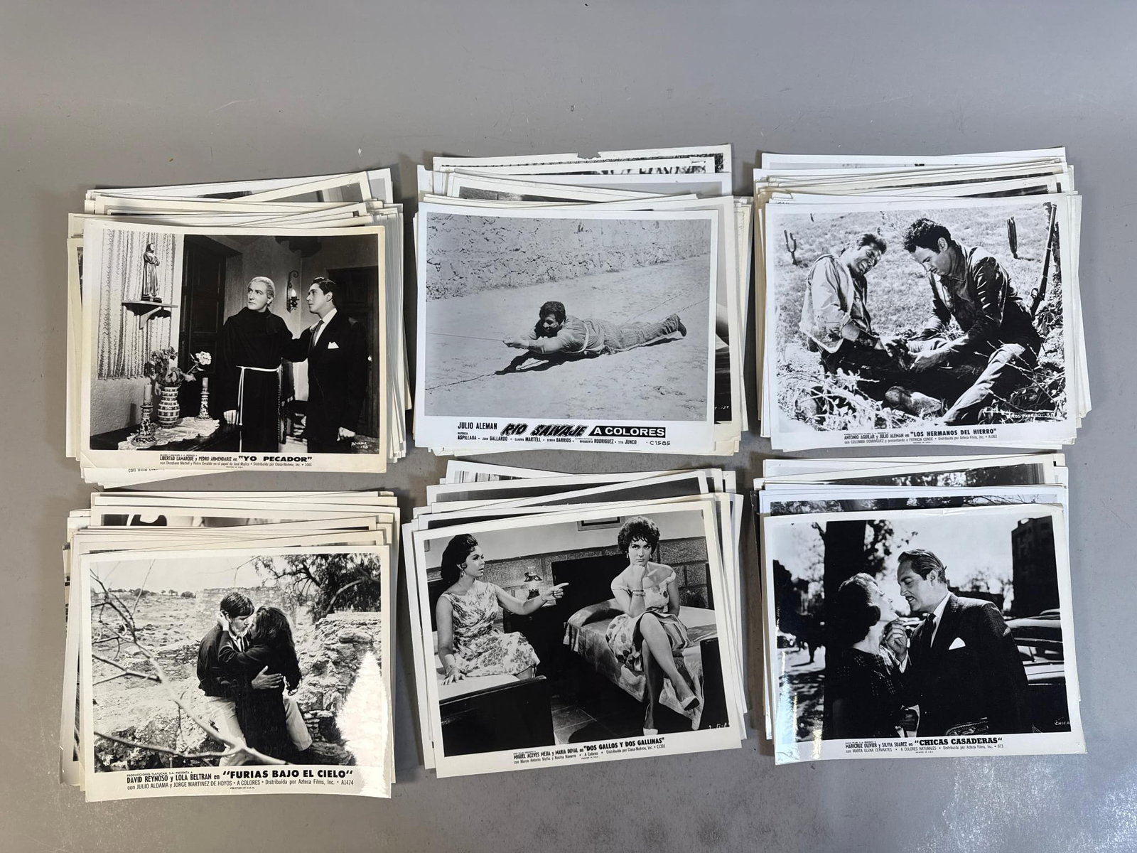 A Collection of Vintage Mexican Cinema Promotional Movie Publicity Stills, Mid-20th Century: A collection of vintage black and white photographic publicity stills, predominantly 8x10 inches, for various Spanish-language films from Mexican cinema, circa 1950s-1960s. Each photograph features sc