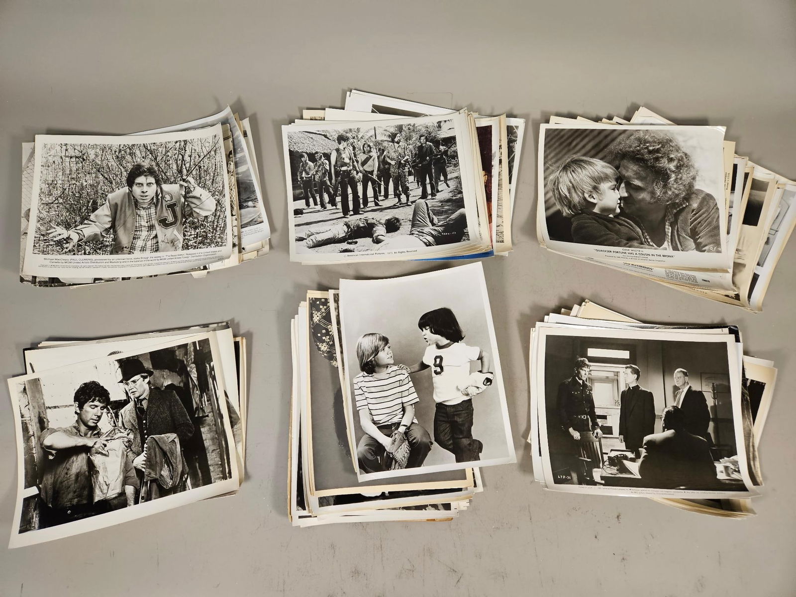 A Collection of Mid-to-Late 20th Century Film and Television Production Stills and Publicity: A substantial group of vintage photographic prints, predominantly black and white with some color examples interspersed. These prints are production stills and publicity photographs from various film