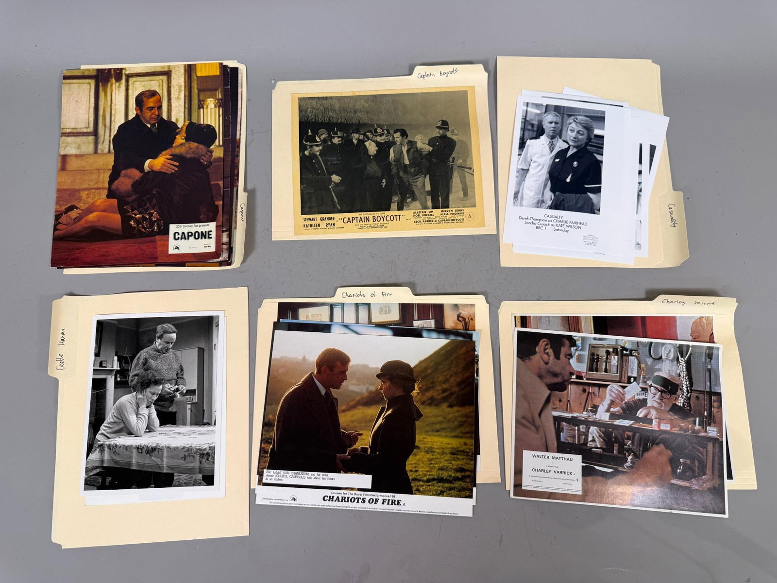 A Collection of Vintage and Modern Film and Television Promotional Stills and Lobby Cards, circa: A collection of vintage and modern film and television promotional still photographs and lobby cards, primarily black and white or color photographic prints. The collection spans from the late 1940s,