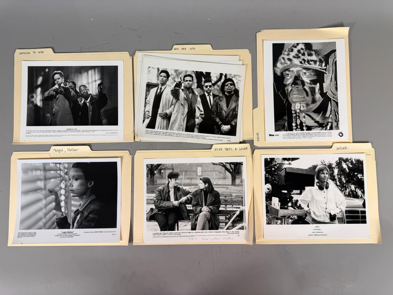 A Collection of Film and Television Publicity Stills, 1980s-2000s: A collection of black and white photographic press stills, likely silver gelatin, dating from the mid-1980s to the early 2000s. The group comprises group of folders, each labeled and containing public