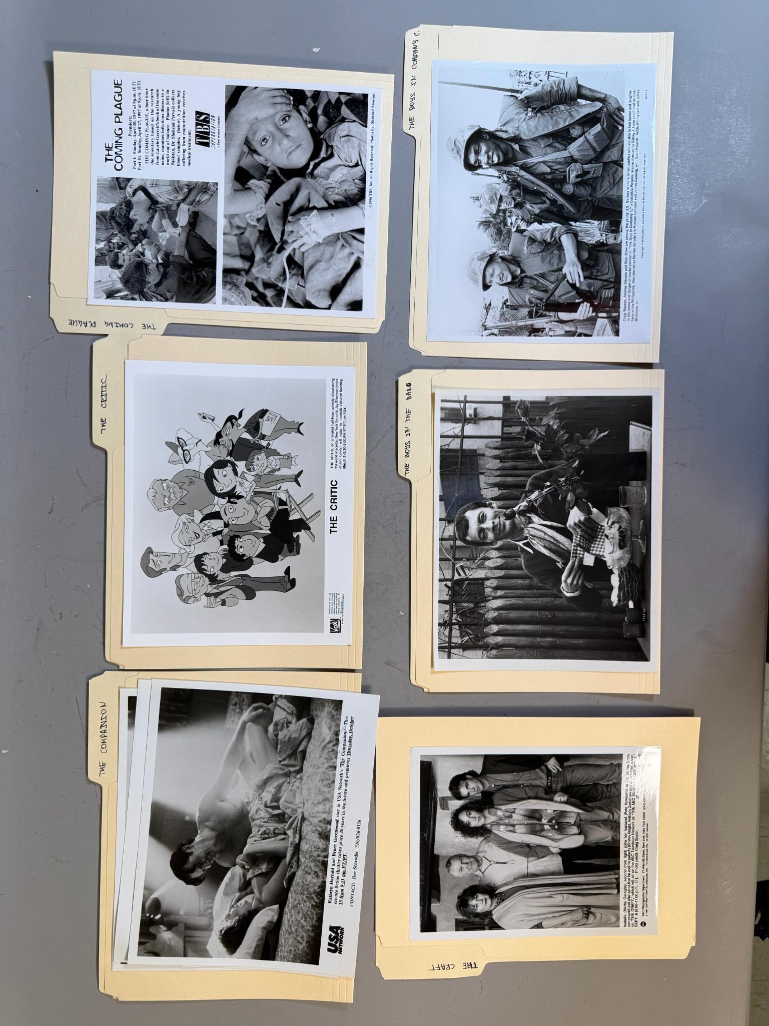 A Collection of Vintage Black and White Photographic Press Prints from Television Shows and Films: This lot comprises a group of manila file folders, each containing or more vintage black and white photographic press prints. The folders are hand-labeled on their tabs with titles such as "THE COMPAN