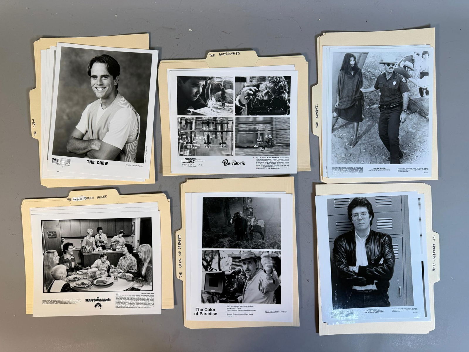A Collection of Original Black and White Promotional Press Photographs for Film and Television,: A collection of original black and white promotional press photographs, likely gelatin silver prints, organized within group of standard manila file folders. Each folder is hand-labeled in black ink w