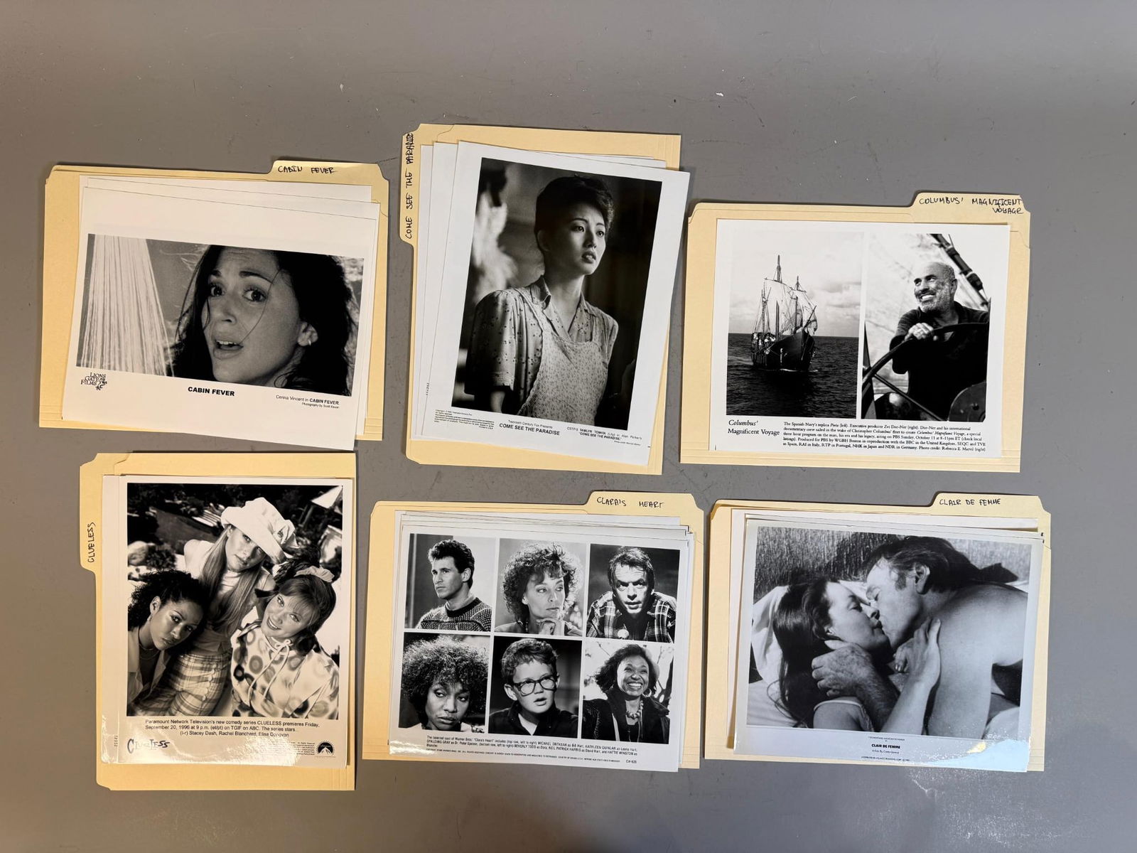 A Collection of Late 20th Century Film and Television Publicity Stills, including 'Clueless' and: A collection of black and white press photographs, primarily publicity stills for various films and television shows, dating from the late 1980s to mid-1990s. The images are printed on glossy photogra