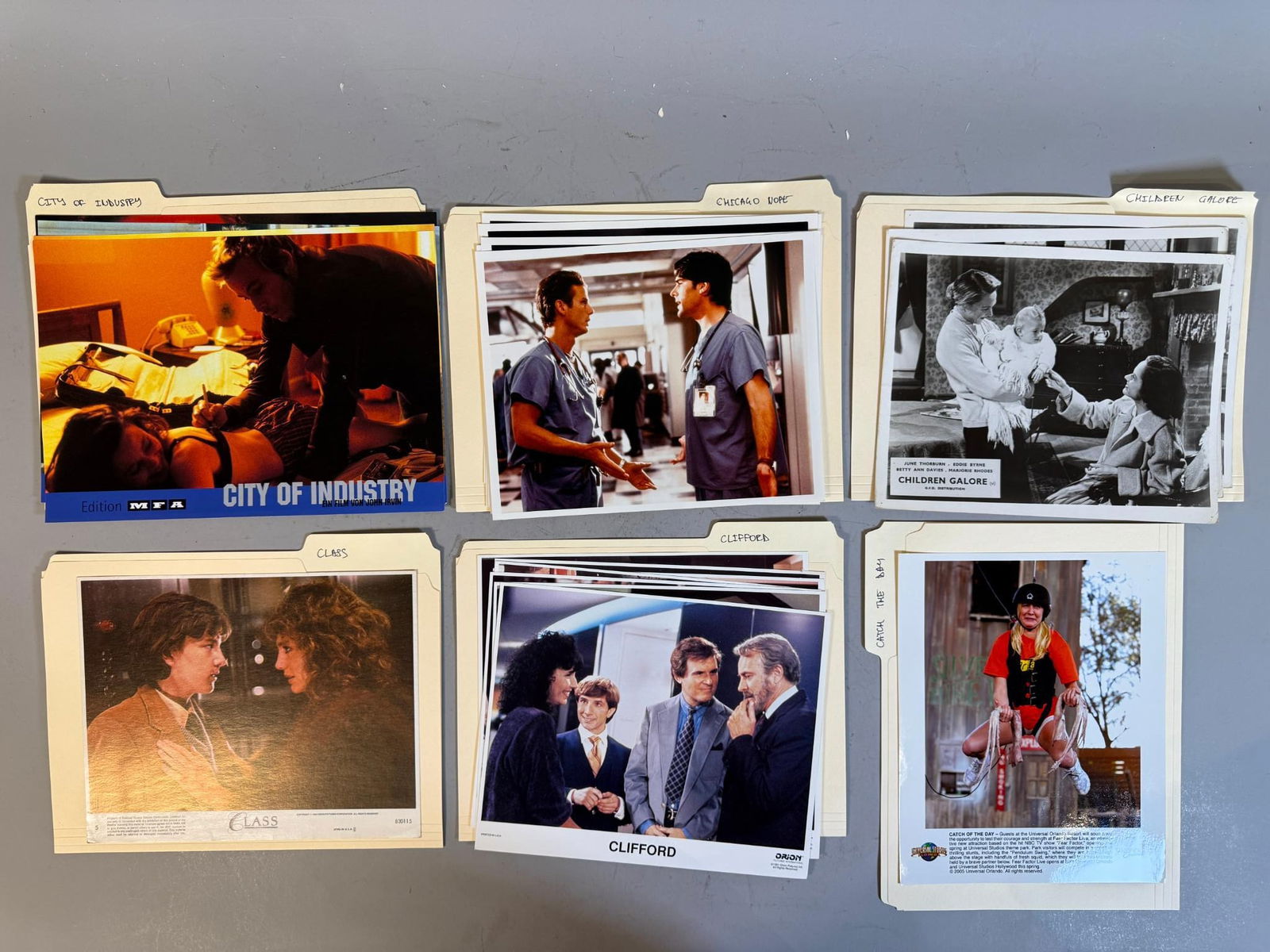 A Collection of Promotional Still Photographs from Various Films and Television Series, 1980s-2000s: A group of promotional still photographs, primarily 8x10 inch photographic prints, dating from the early 1980s to the mid-2000s. The collection includes both black and white and color prints, organize