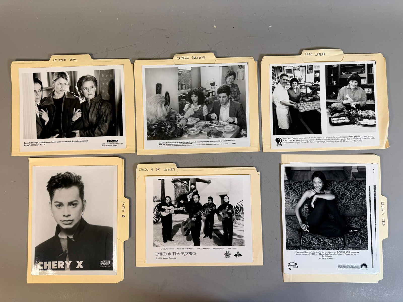 A group of Promotional Press Photographs for Music, Film, and Television, Late 1980s-Late 1990s: A group of manila file folders, each containing group of or more black-and-white photographic press prints, primarily 8x10 inches in size. These promotional photographs feature artists and media from