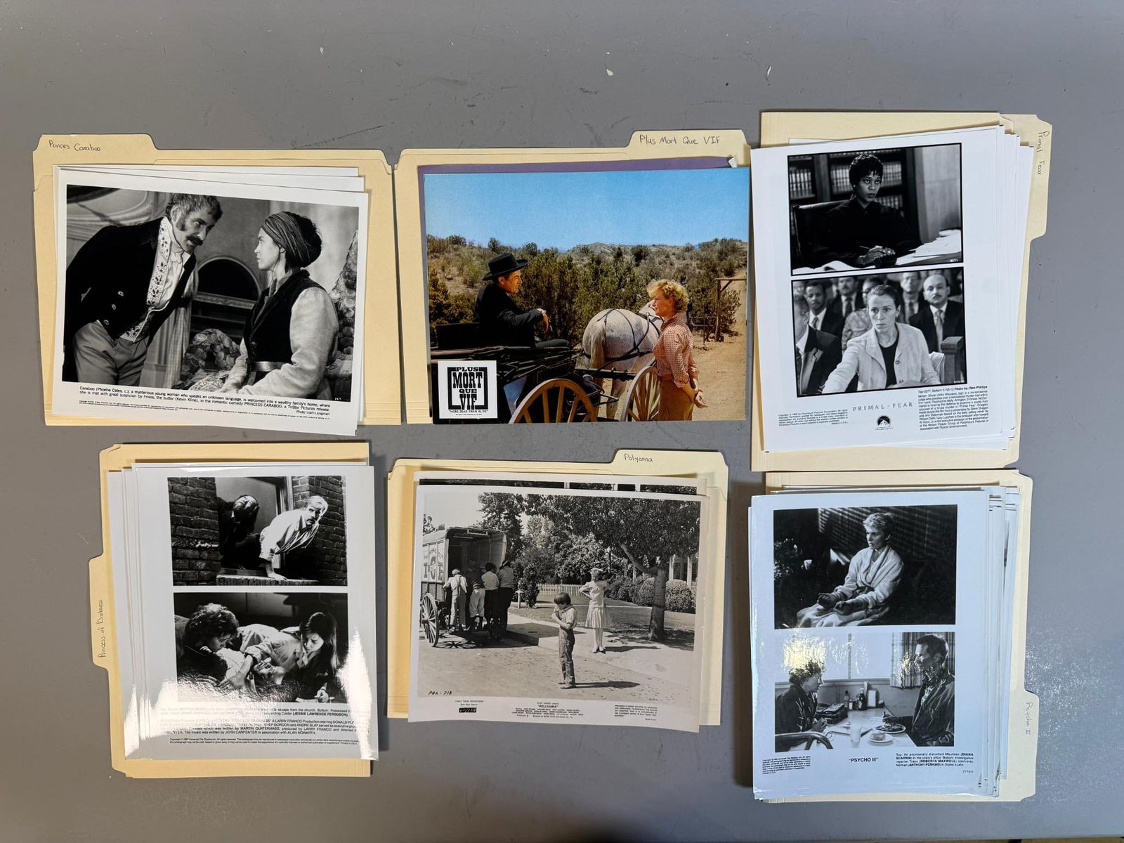 A Group of Vintage Movie Publicity Photographs in Labeled Folders (1 of 13)