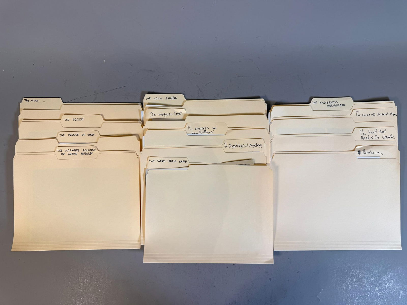 A Collection of Vintage Film and Television Press Photographs and Materials, 1960s-1970s: A collection of manila file folders filled with numerous black and white photographic prints and associated press materials, predominantly from the 1960s and 1970s. The folders are labeled with variou