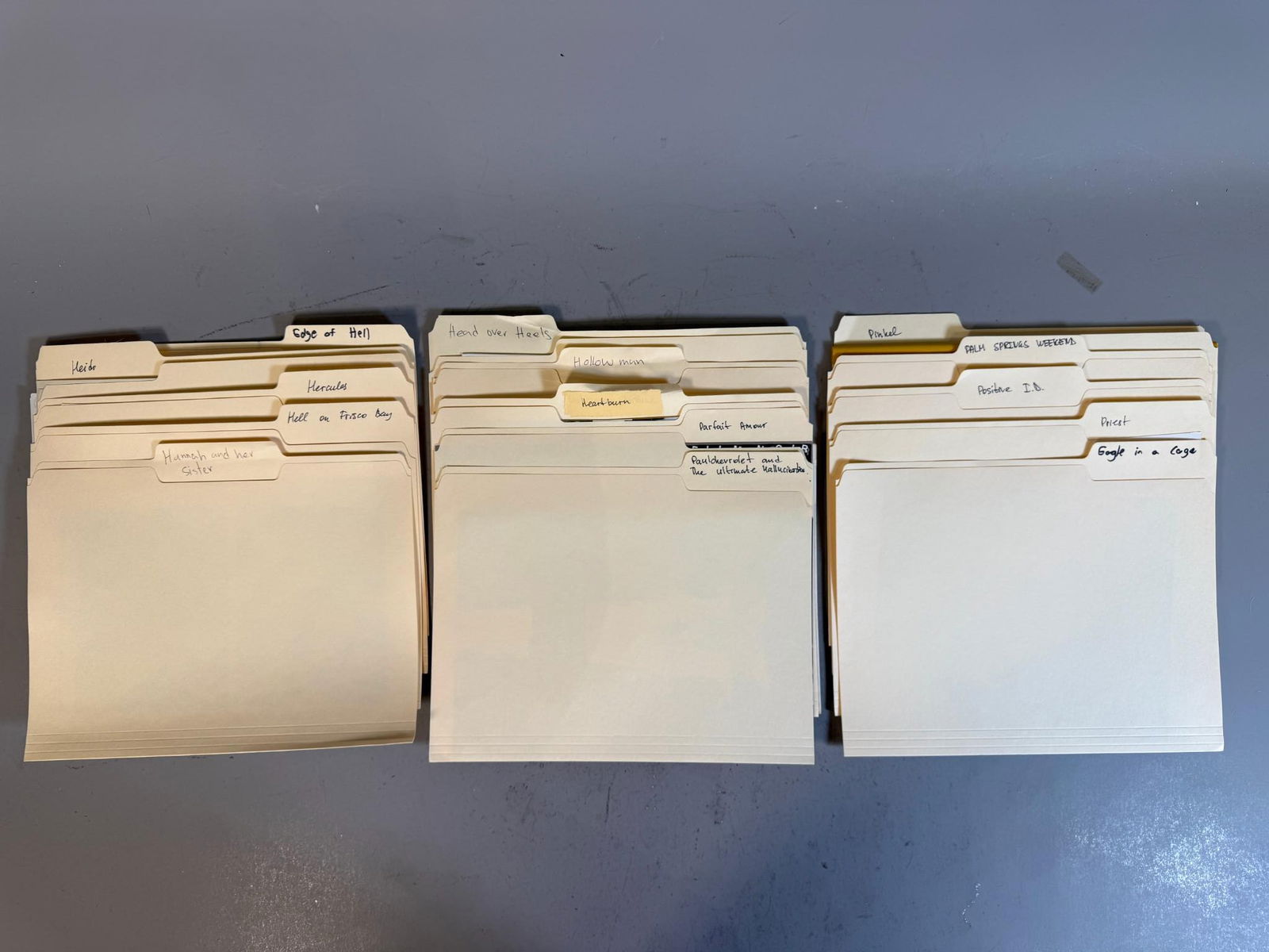 A Collection of Mid-to-Late 20th Century Film and Television Production Materials in Pendaflex File: A collection of mid-to-late 20th-century film and television production materials, comprising photographic prints, film stills, promotional materials, and booklets. The materials are predominantly in