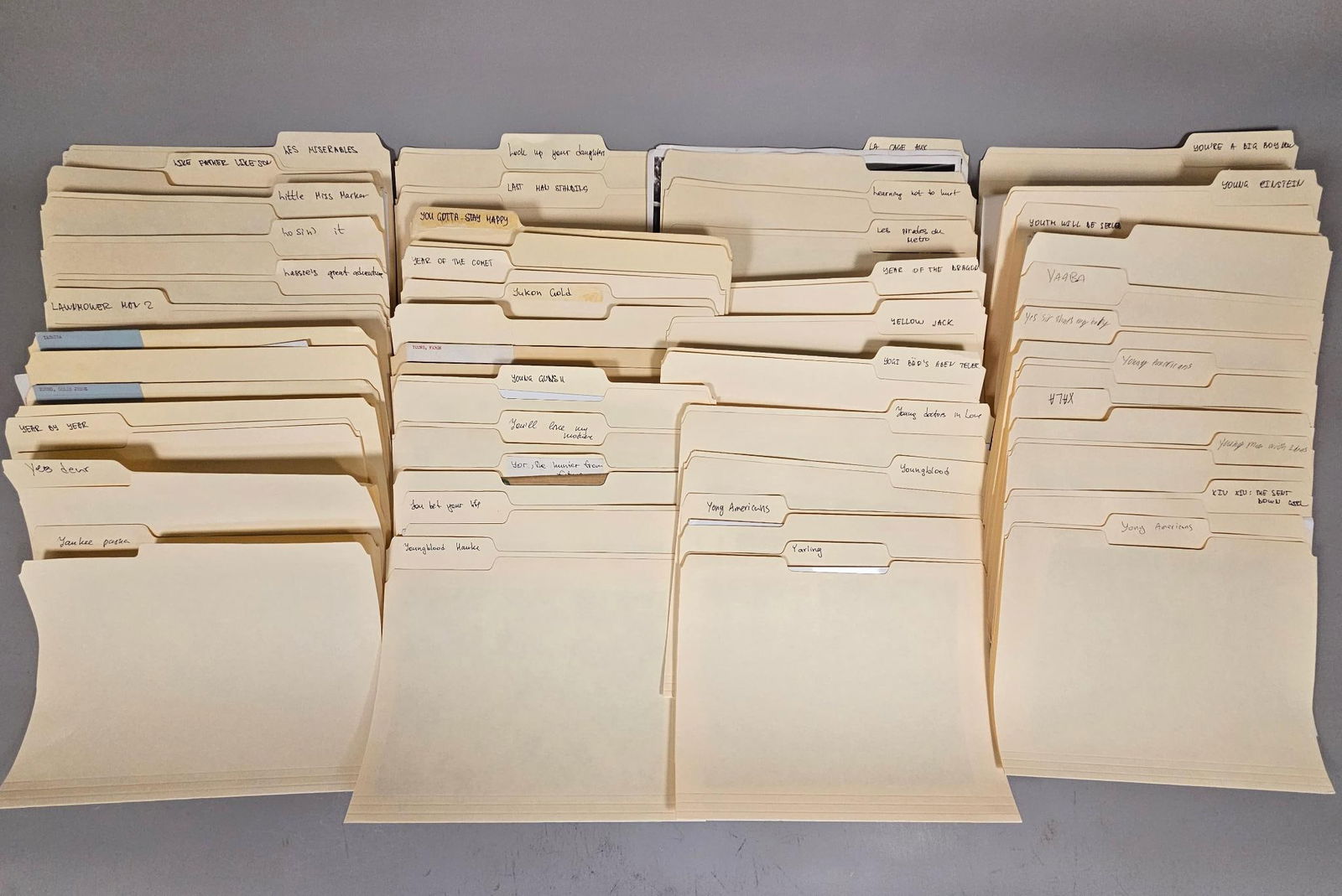 A Large Archive of Film and Television Production Materials, Mid-20th to Early 21st Century: This extensive collection comprises hundreds of black and white (with some color) photographic stills, slide transparencies, scripts, and press releases, predominantly related to film and television p