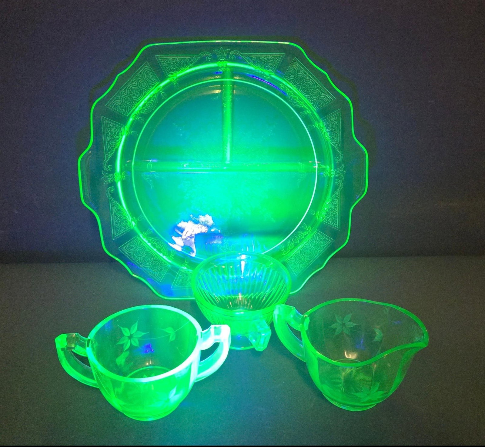A Four-Piece Collection of Green Uranium Vaseline Depression Glass Tableware (1 of 11)