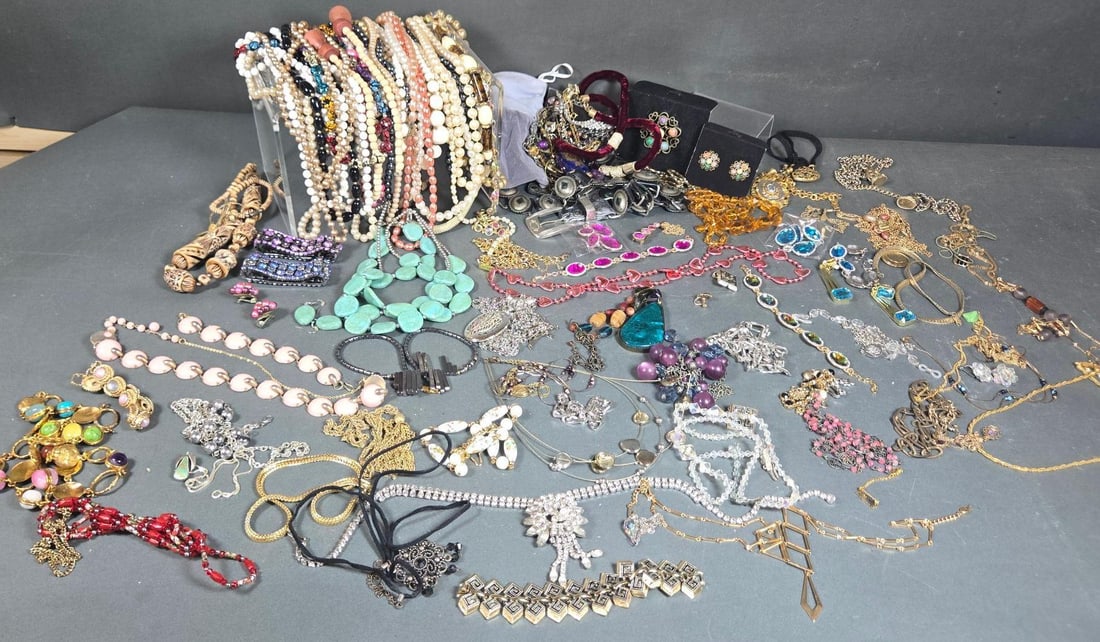 A Large Collection of Costume Jewelry, including simulated pearls, beaded designs, metal chains, (1 of 7)