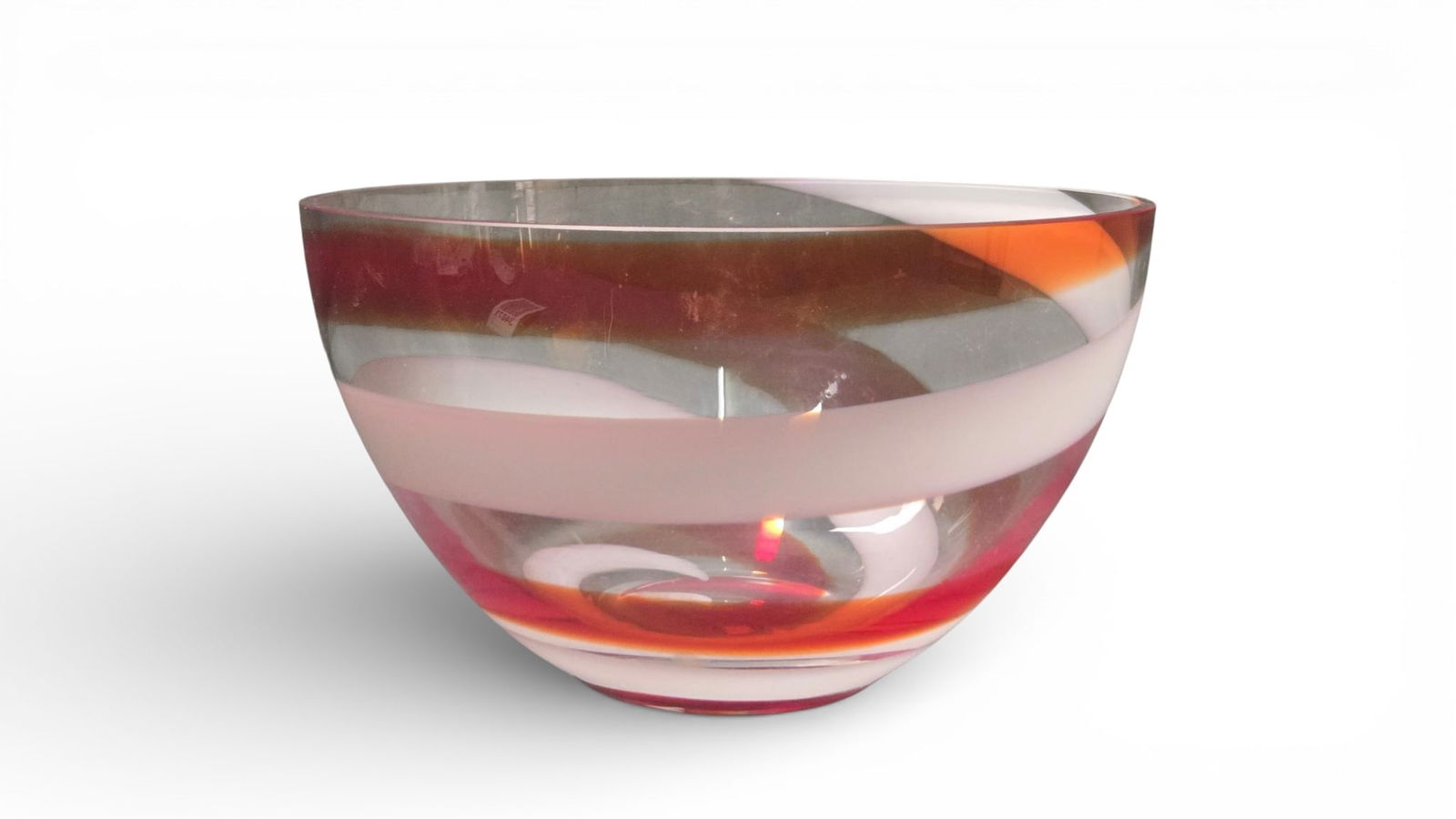 A Tarnoviec Art Glass Bowl, Made in Poland, with Red and White Spiral Swirl Design: A contemporary art glass bowl by Tarnoviec, made in Poland. Crafted from clear glass, it features a distinctive internal spiral design composed of opaque white and translucent reddish-orange/brownish