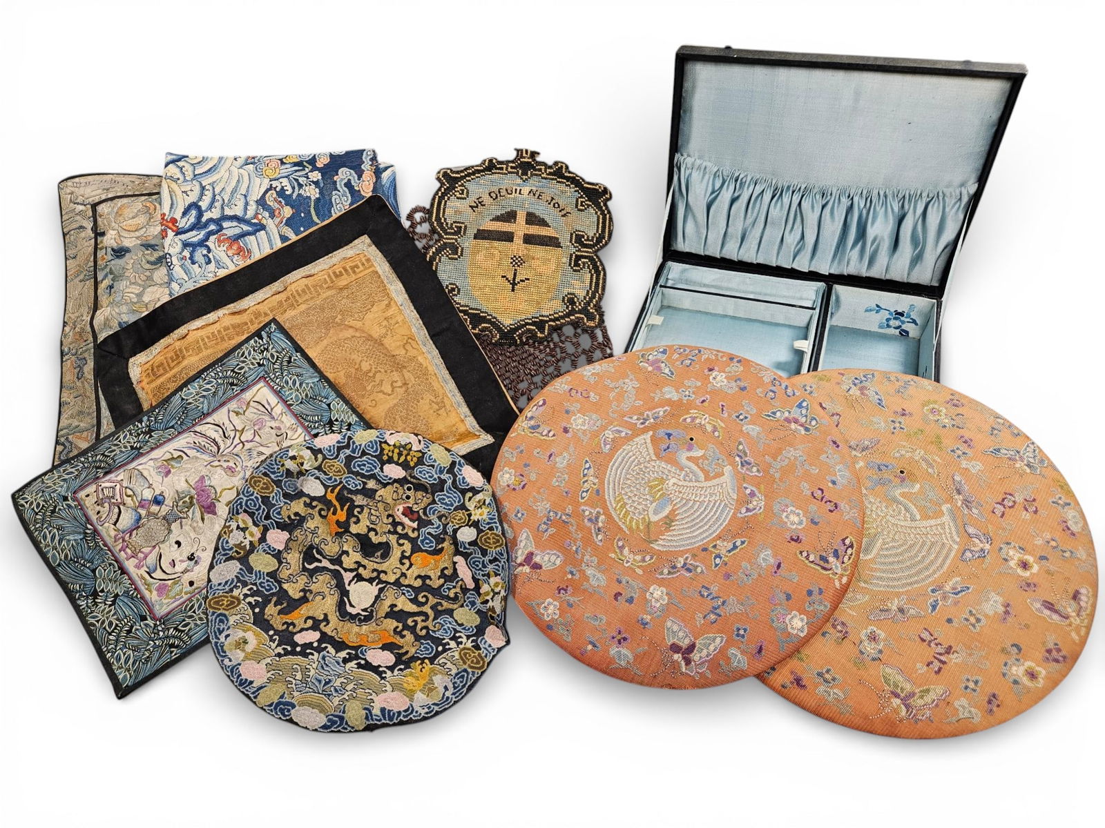 Chinese Embroidered Silk Textiles, including Rank Badges, a Needlepoint Plaque, a Seed Art Mat: NOTE: A SCAMMER BOUGHT THESE IN OUR DEC 2 AUCTION - HIS NAME WAS RAYMOND JOY FROM CROTON ON HUDSON. HE NEVER PAID. HE HAS BEEN PUTTING OUR PHOTOS OF THESE ITEMS ON EBAY AND TAKING BIDS BUT HE IS A