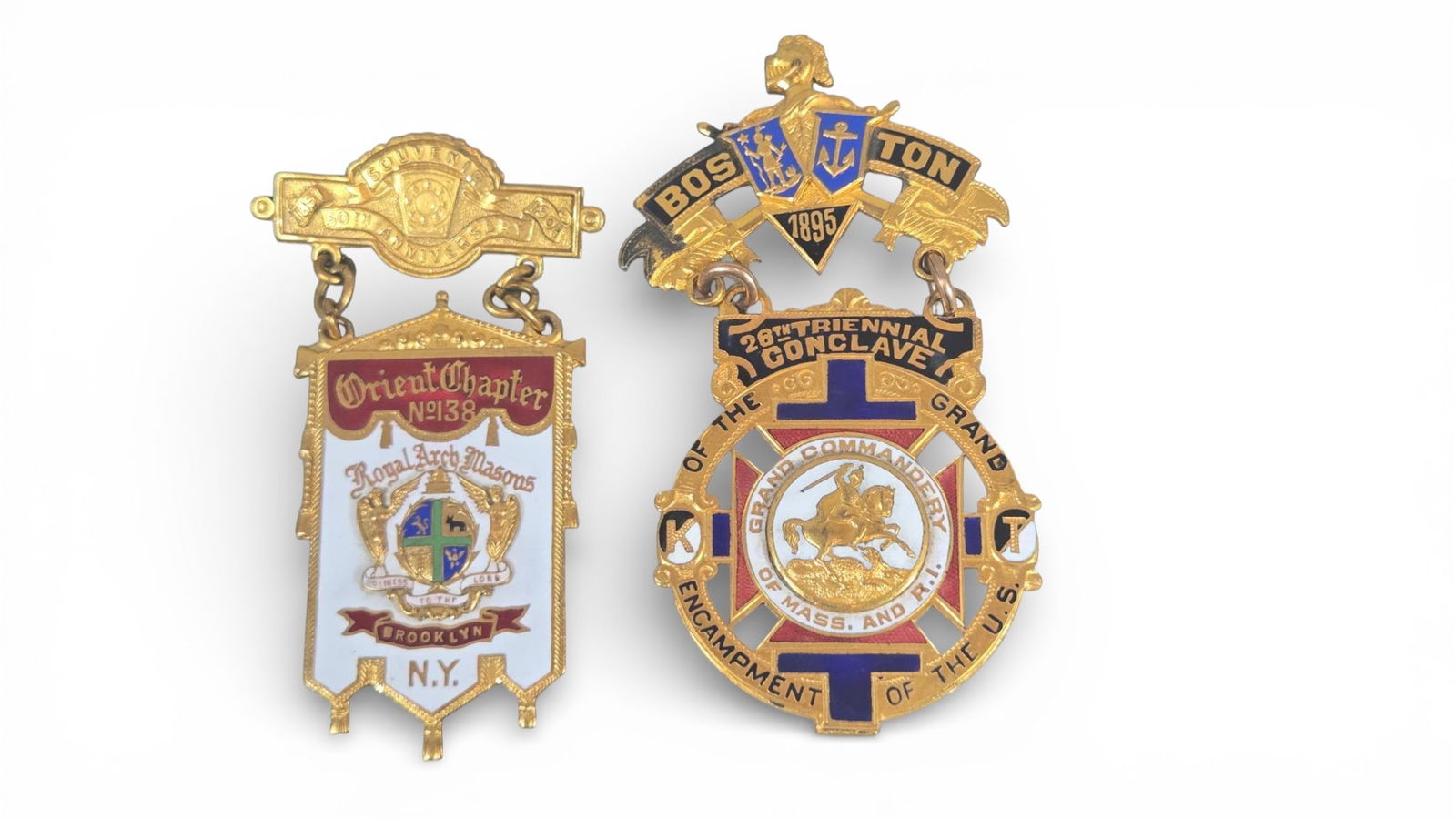 A group of Late 19th Century Masonic and Knights Templar Commemorative Medals: A group of late 19th century fraternal organization commemorative medals, constructed from gold-toned metal with polychrome enamel detailing. Both items are two-part badges featuring a top pin bar