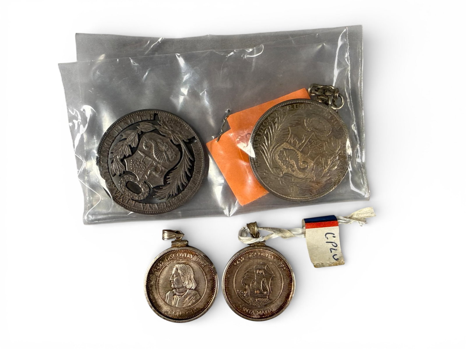 A Collection of Silver Peruvian and Commemorative Medallions (1 of 9)