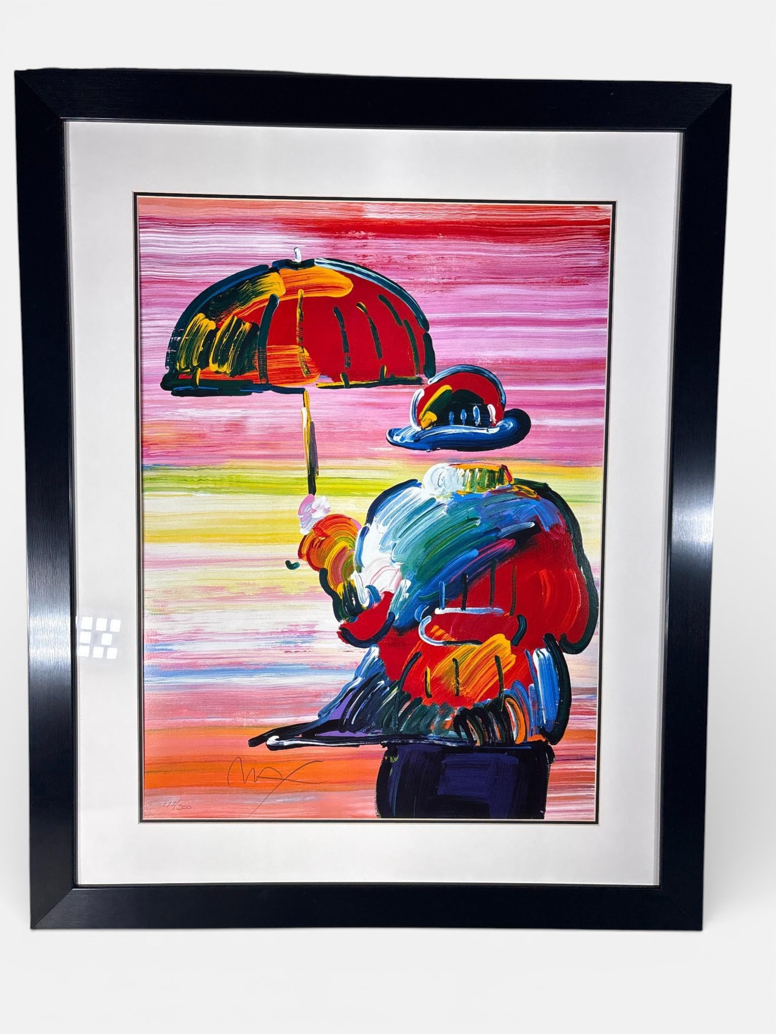 Peter Max Umbrella Man III Signed Limited Edition Lithograph 2004 177/300: A framed and matted Peter Max "Umbrella Man III" lithograph, numbered 177/300, featuring a 2004 blind stamp and purchased at Galerie Concorde, Quebec City, measuring 28 x 21 inches (sheet size). Frame