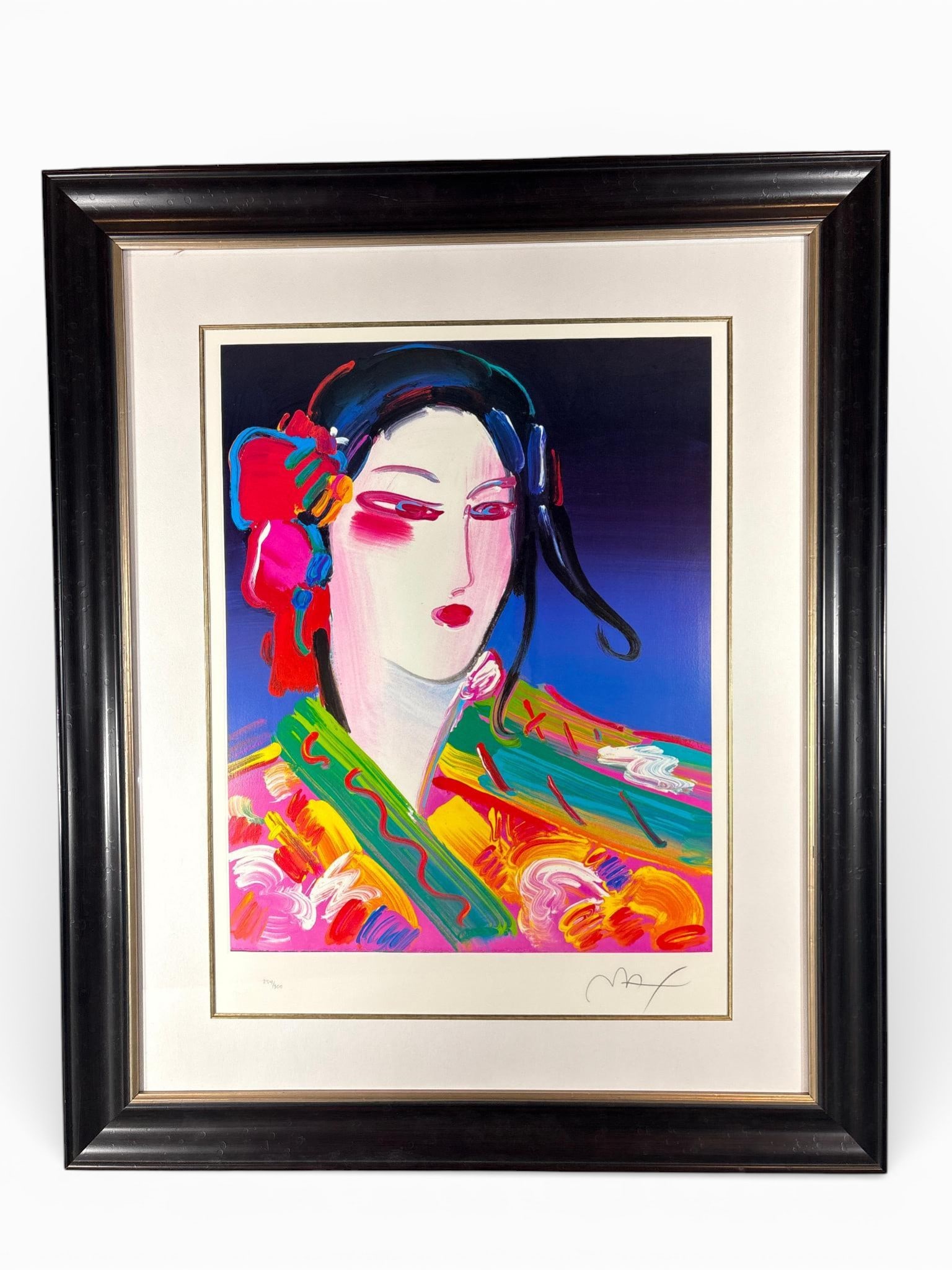Peter Max Asia II Signed Numbered Lithograph 254/300 2003: A framed, multi-color lithograph titled Asia II by Peter Max, pencil signed and numbered 254/300, featuring a stylized woman's face, a Peter Max 2003 blind stamp, and confirmed as a print bought at Ga
