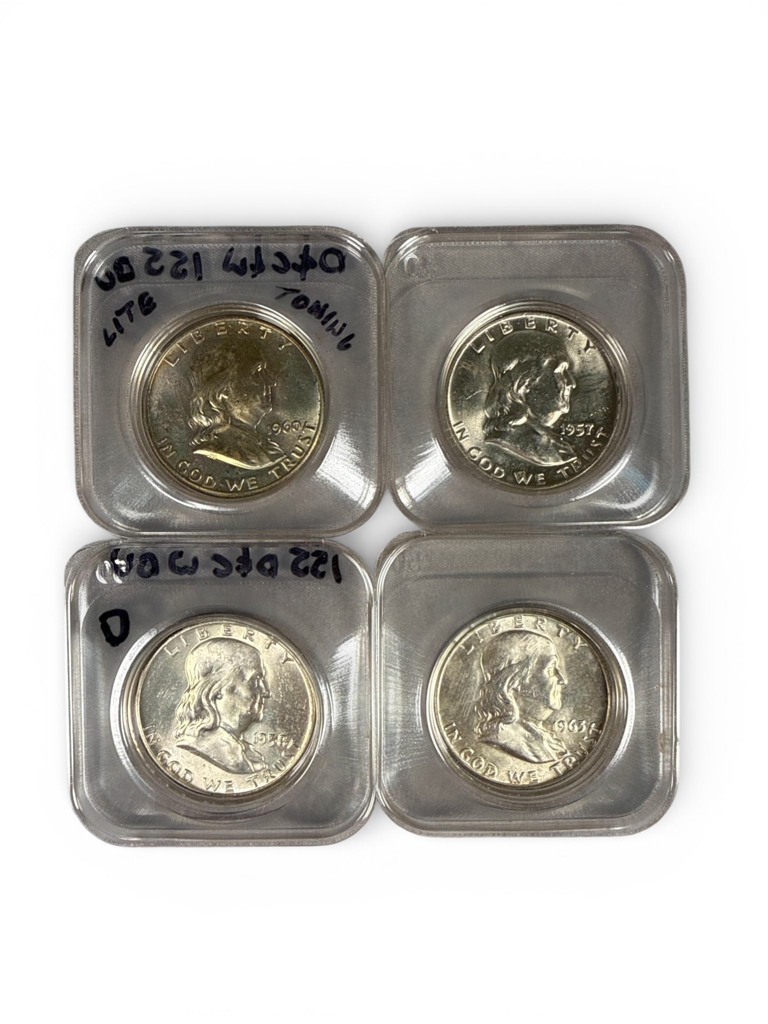 A group of United States 90% Silver Franklin Half Dollars (1 of 13)