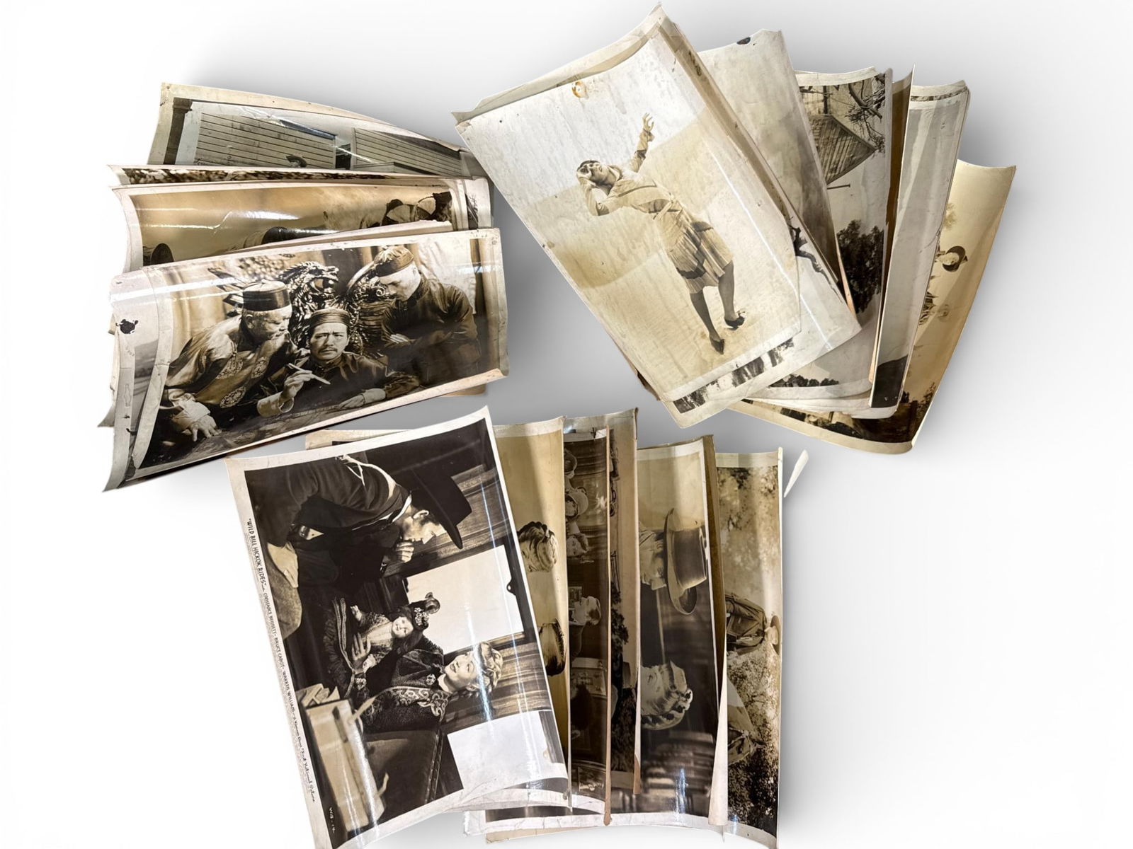 A Collection of Vintage Movie Stars Exhibit Cards, 1960s: A collection of vintage movie stars exhibit cards, likely dating from the 1960s. Comprising black and white photographic cards, primarily depicting scenes from American Western films, featuring