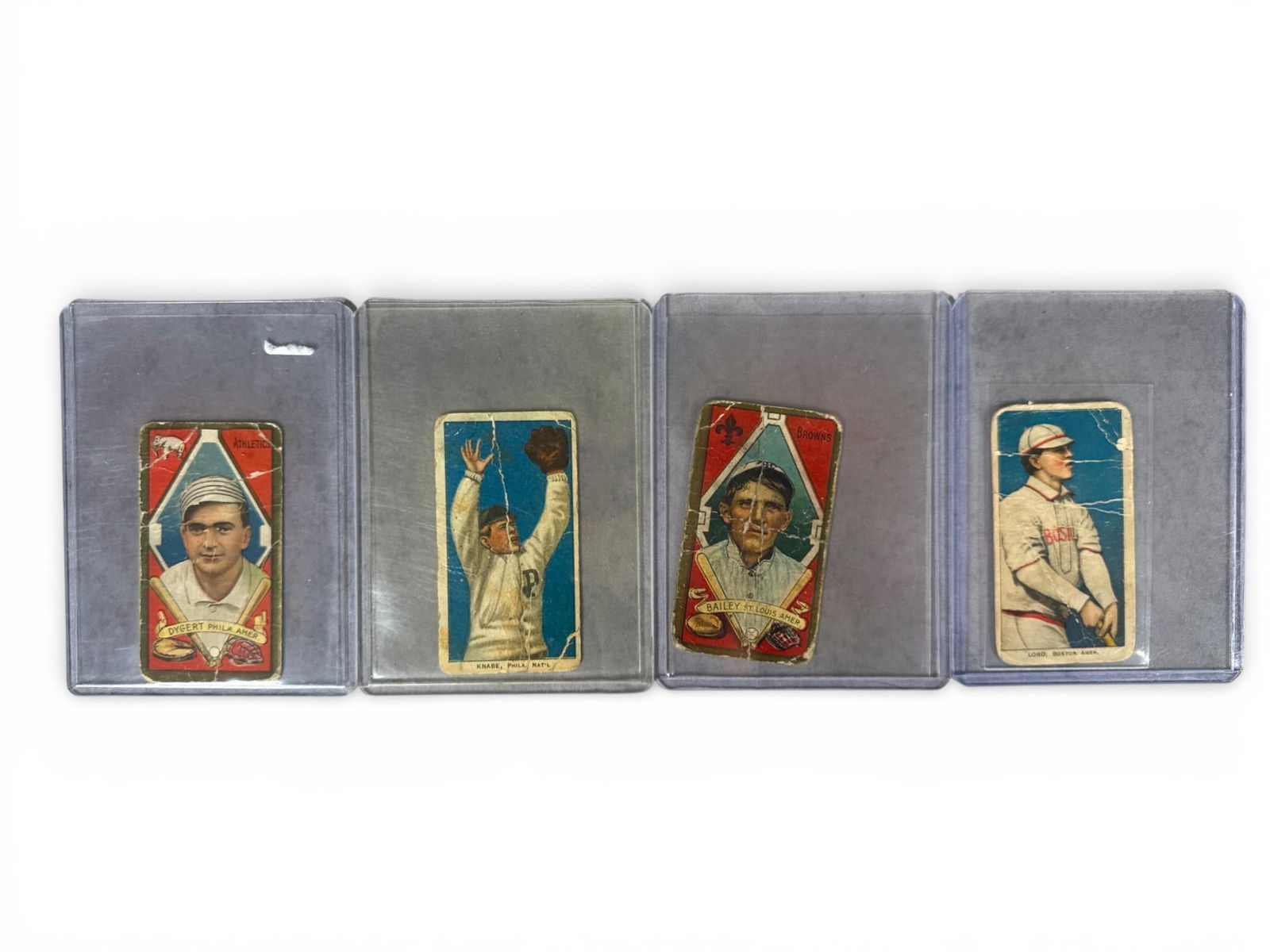 A group of T206 American Tobacco Company Baseball Cards: A group of antique baseball cigarette cards from the American Tobacco Company's T206 series, dating circa 1909-1911. The cards are constructed of cardboard stock featuring color lithographic images