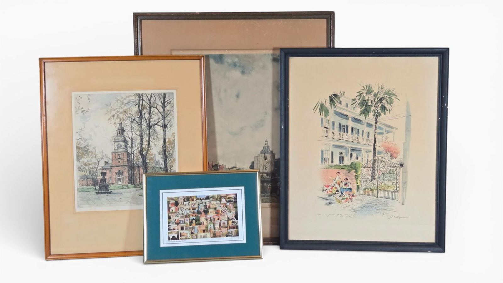 A Collection of Framed Prints Including John Haymson House and Garden Gate Charleston SC: A collection of individually framed pictorial artworks, appearing to be late 20th-century reproductions or prints, presented under glass. The collection includes distinct subjects and framing styles.
