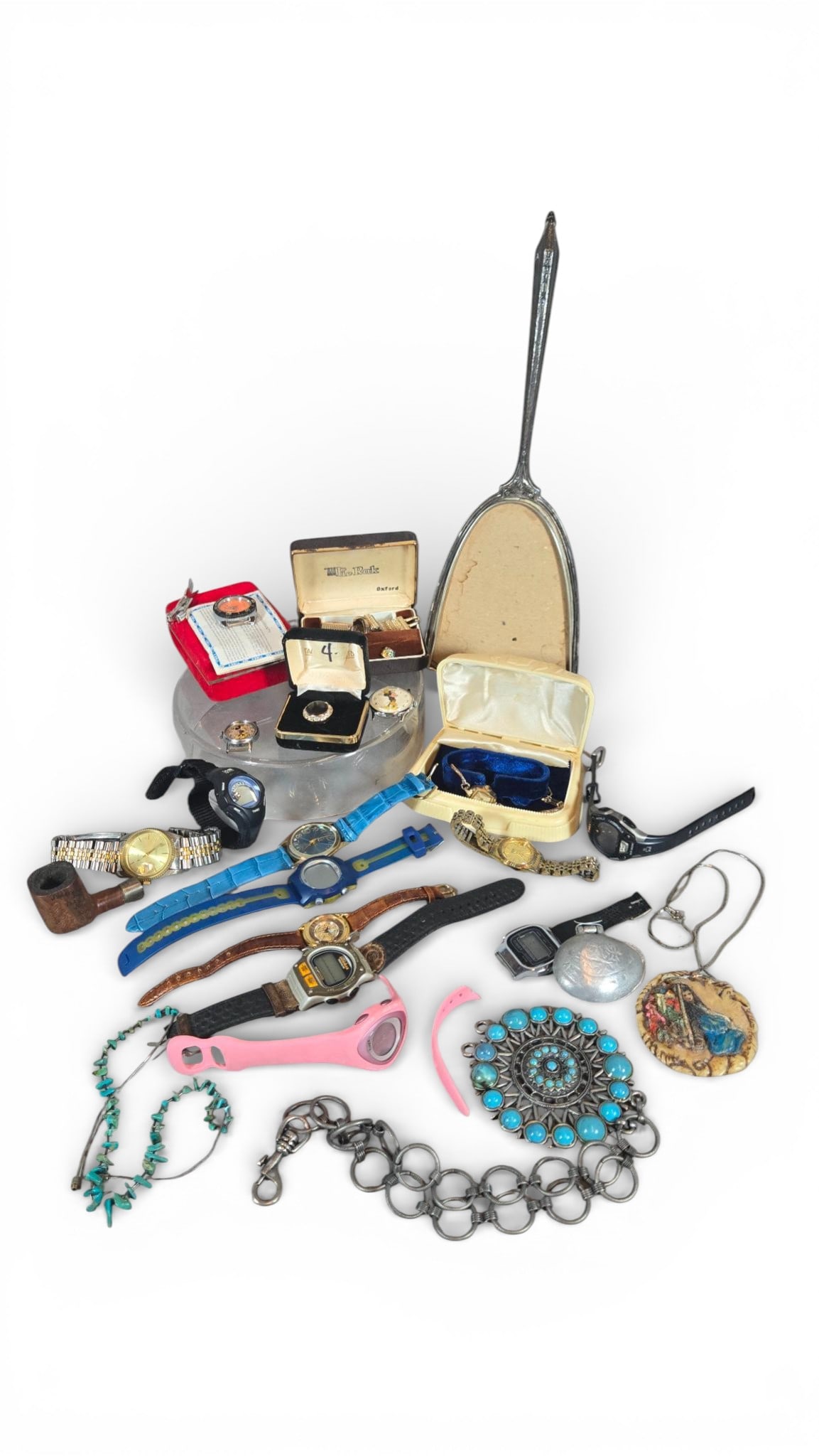 Vintage and Modern Costume Jewelry, Watches, and Accessories Lot: The collection consists of items of vintage and modern costume jewelry, wristwatches, and miscellaneous accessories. The lot includes assorted wristwatches, featuring both analog and digital displays,