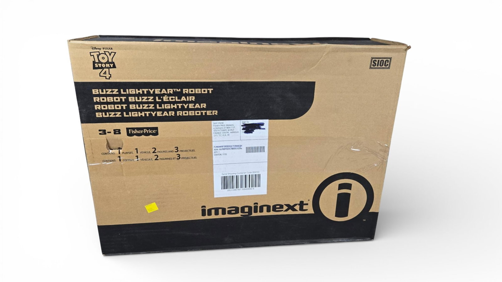 Fisher-Price Imaginext Toy Story Buzz Lightyear Robot: A factory-sealed corrugated cardboard shipping container for the Fisher-Price Imaginext Buzz Lightyear Robot, co-branded with Disney Pixar Toy Story 4. The packaging identifies the item as the Buzz Li
